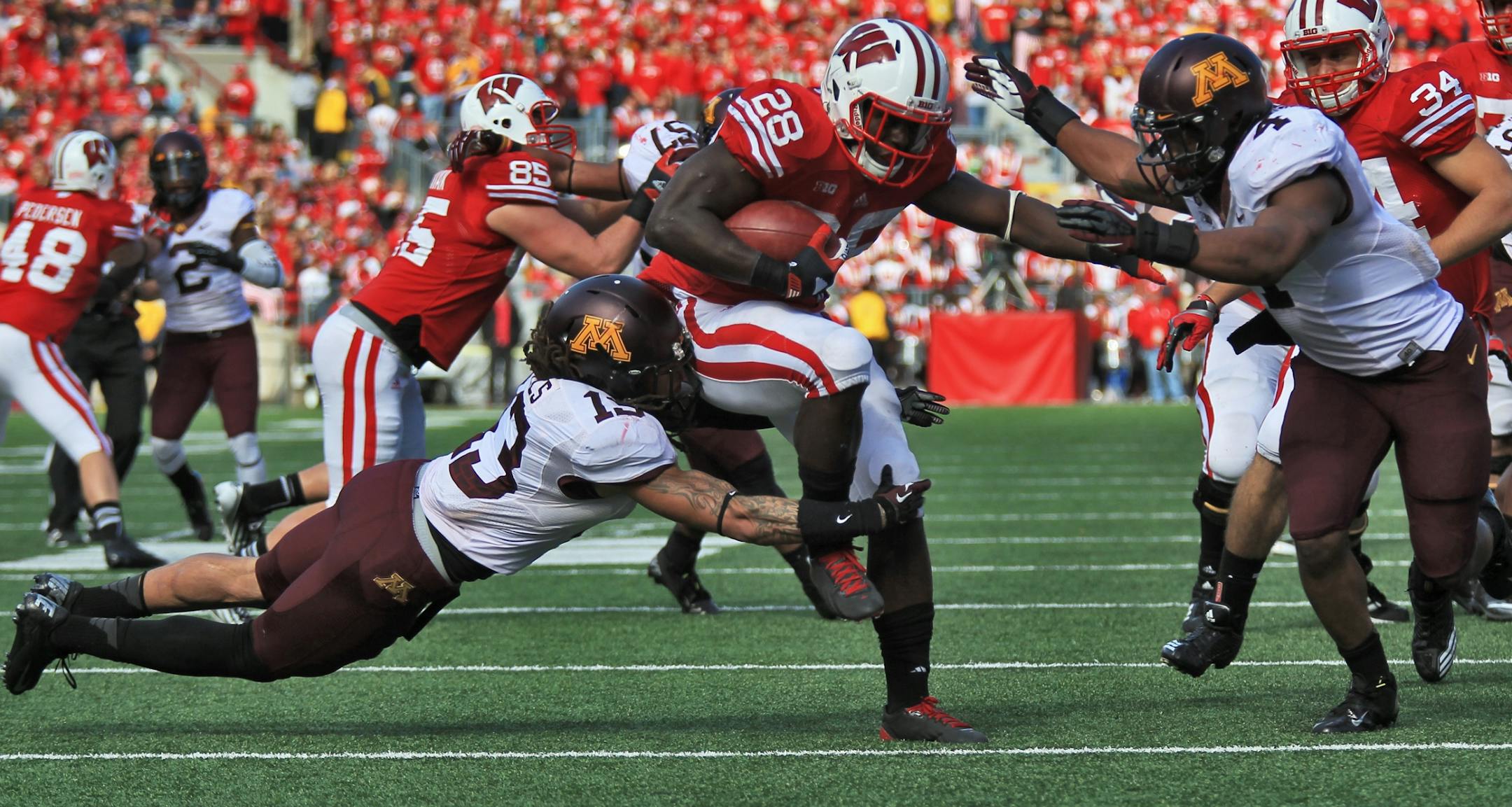 Minnesota Gophers vs. Wisconsin Badgers. Wisconsin won 38-13. Wisconsin running back Montee Ball (28) bowled his way through the Minnesota defense to score the first of two touchdowns in the game. (MARLIN LEVISON/STARTRIBUNE(mlevison@startribune.com