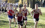 Maple Grove's Alex Miley, right, set the pace during a cross-country meet Tuesday at Central Park in Brooklyn Park.