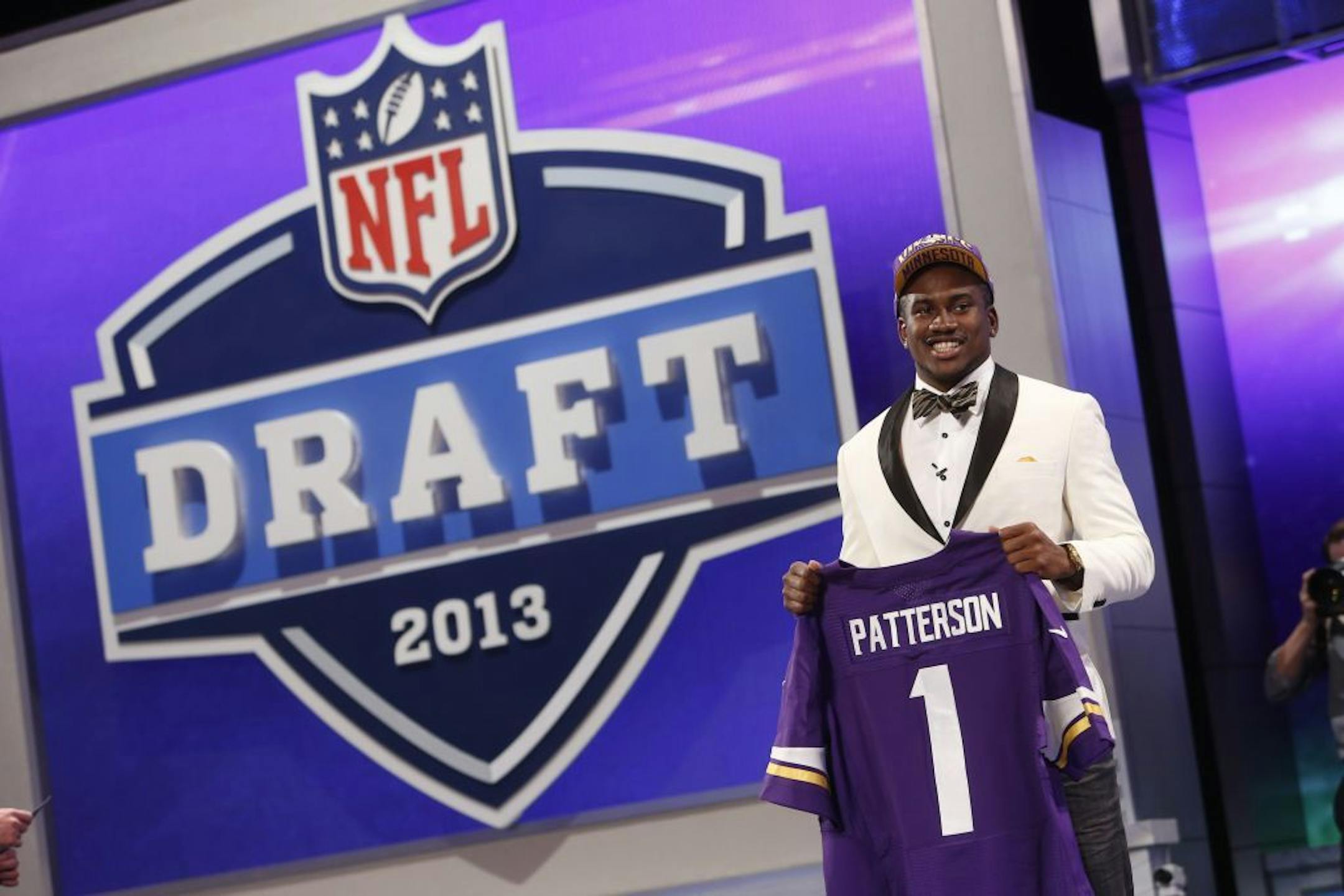 Wide receiver Cordarrelle Patterson from Tennessee holds up the team jersey after being selected 29th overall by the Minnesota Vikings in the first round of the NFL football draft, Thursday, April 25, 2013 at Radio City Music Hall in New York.