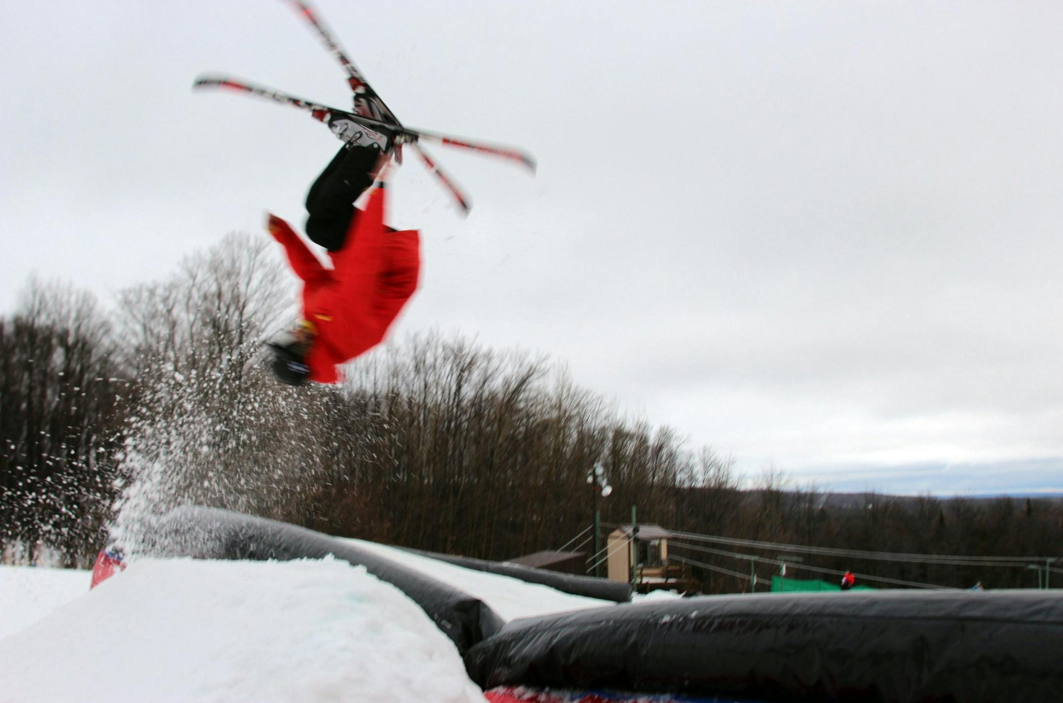 Treetops Resort in Gaylord, Mich., has the only air bag for practicing jumps in the Midwest. This is Christopher Gibson, snow sports specialist at Treetops, spinning through the air on January 9, 2014. (Ellen Creager/Detroit Free Press/MCT) ORG XMIT: 1148530