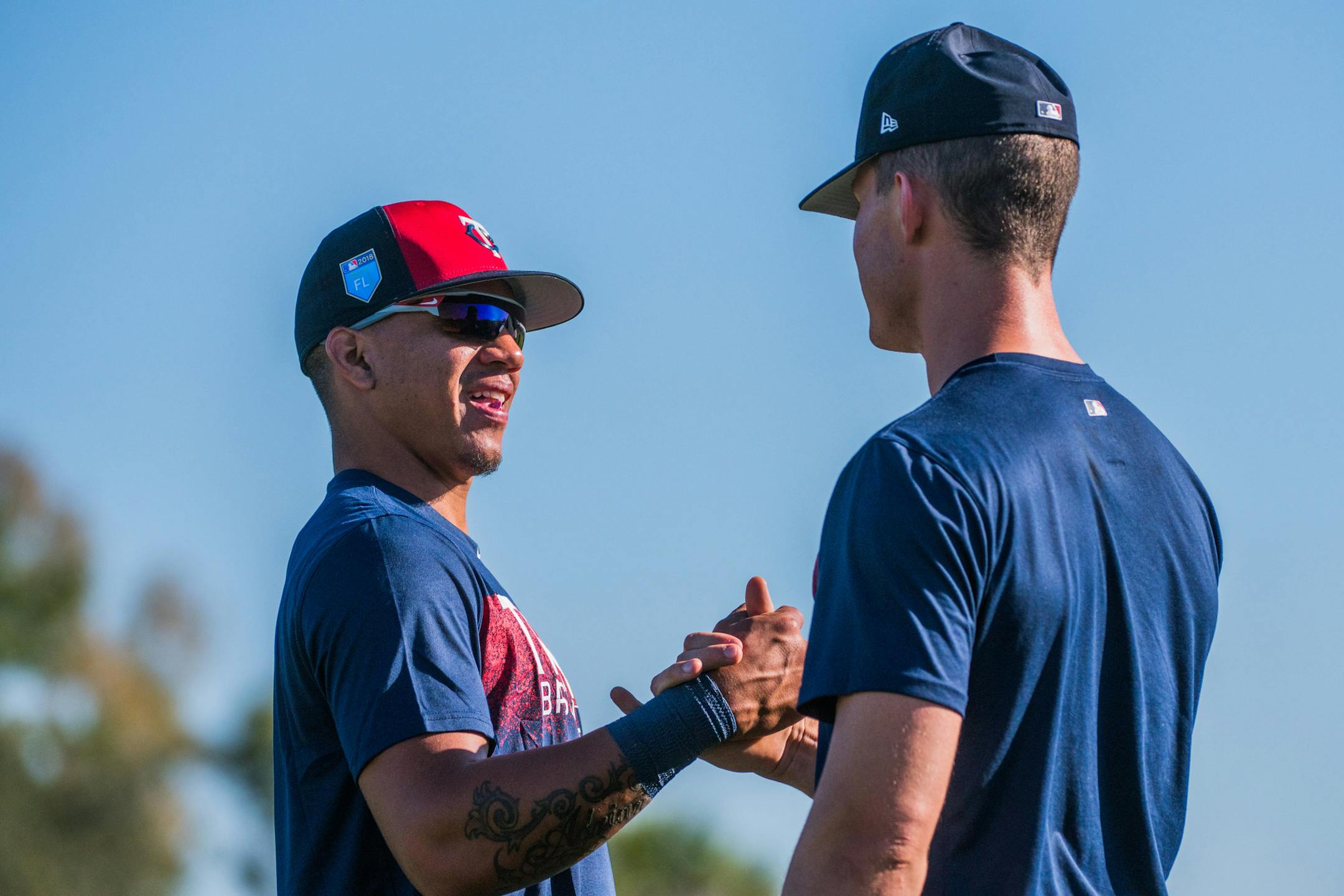 Twins infielder Ehire Adrianza greeted outfielder Max Kepler before workouts. ] MARK VANCLEAVE &#x2022; mark.vancleave@startribune.com * Third day of pitcher and catcher workouts at Twins spring training in Fort Myers, Florida on Friday, Feb. 16, 2018.