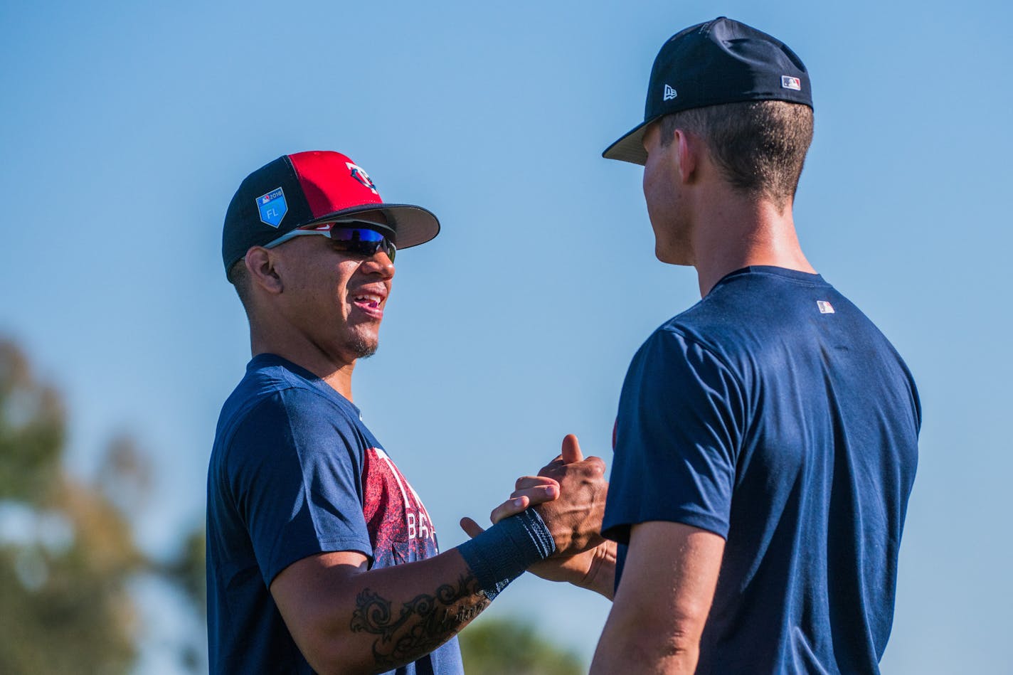 Twins infielder Ehire Adrianza greeted outfielder Max Kepler before workouts. ] MARK VANCLEAVE &#x2022; mark.vancleave@startribune.com * Third day of pitcher and catcher workouts at Twins spring training in Fort Myers, Florida on Friday, Feb. 16, 2018.