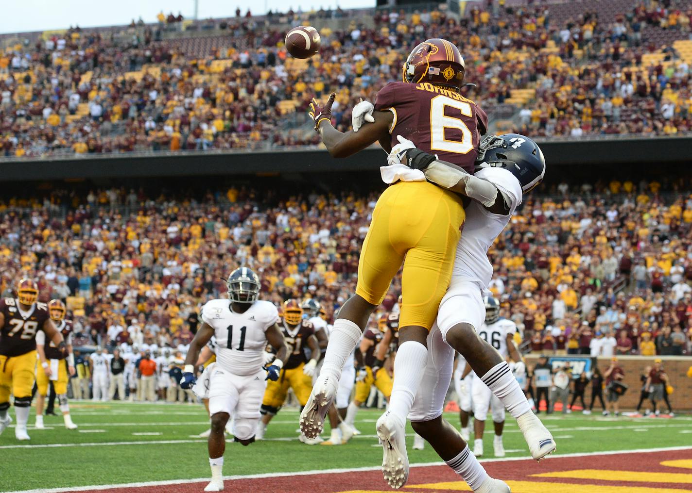 Gophers wide receiver Tyler Johnson pulled down a touchdown catch to put the Gophers back in the lead with 13 seconds left in the fourth quarter as he was defended by Georgia Southern cornerback Monquavion Brinson