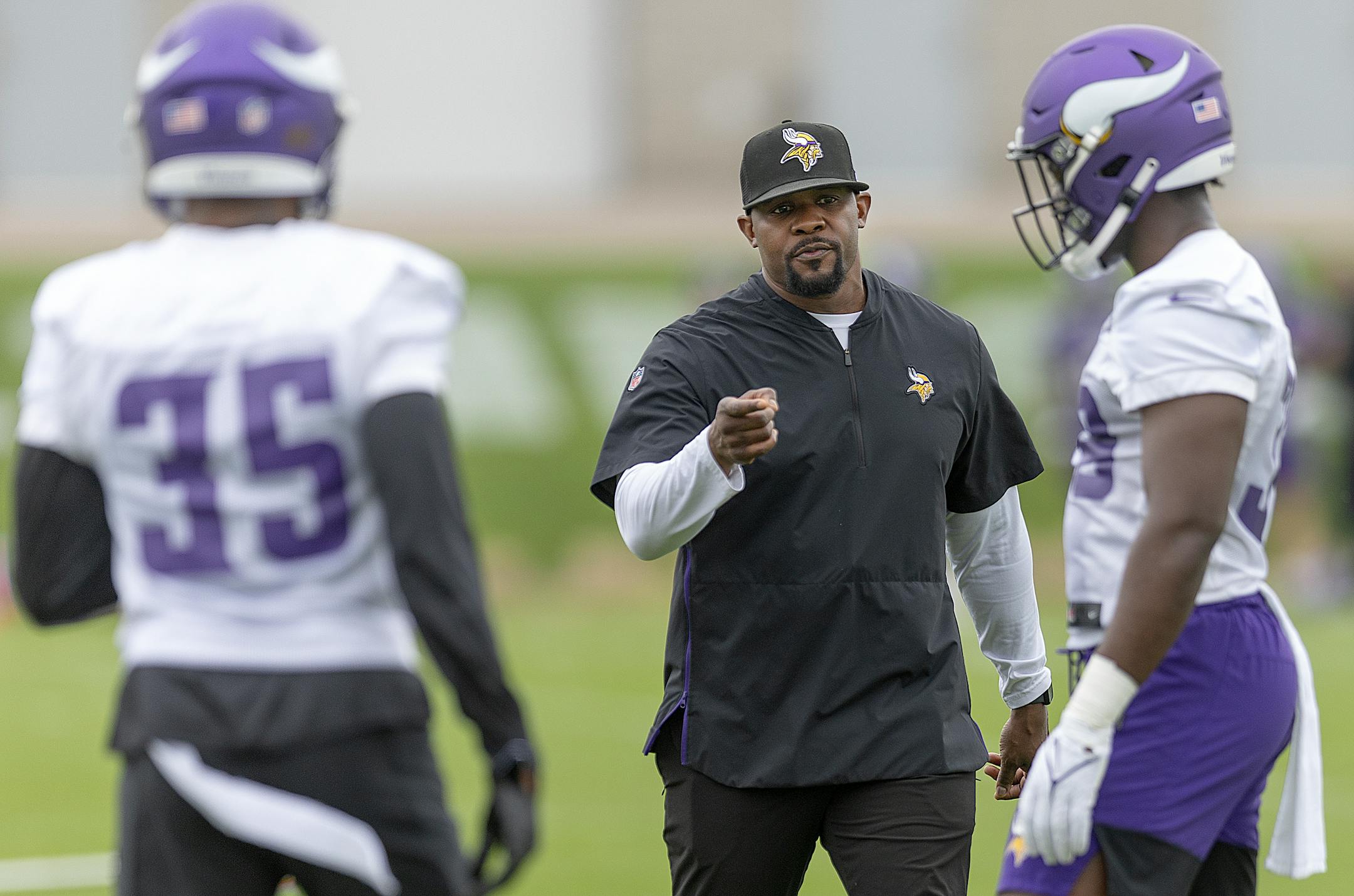 Minnesota Vikings Defensive Coordinator Brian Flores talks to players during Rookie Mini Camp at TCO Performance Center in Eagan, Minn., on Friday, May 12, 2023.
