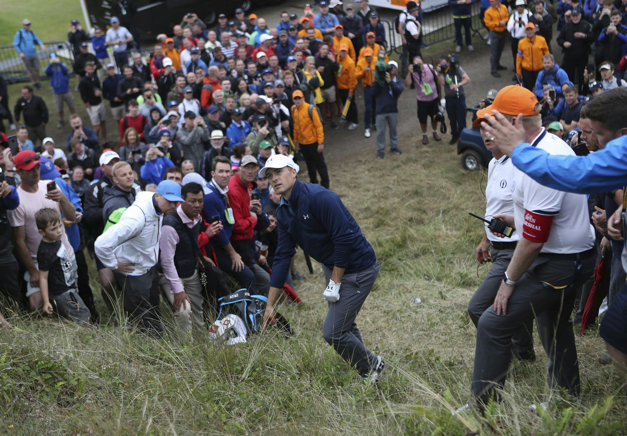 Jordan Spieth of the United States in the rough on the 13th hole during the final round of the British Open Golf Championship, at Royal Birkdale, Southport, England, Sunday July 23, 2017. He took an unplayable lie, leading to a 20 minute delay. (AP Photo/Peter Morrison)