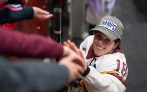 Abbey Murphy celebrated with fans after the Gophers defeated Colgate in an NCAA regional to advance to the Frozen Four in March. Murphy will return fo