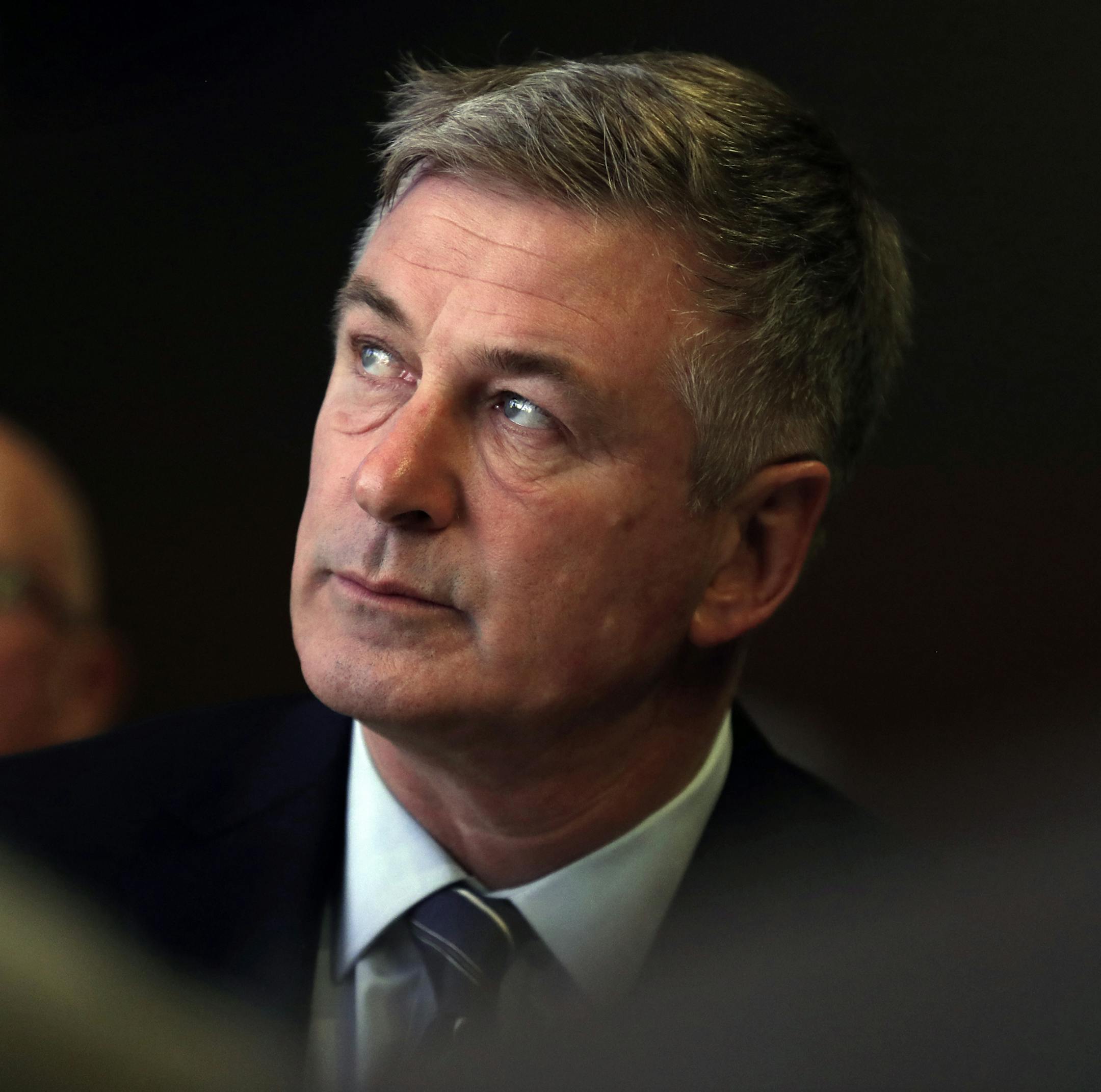 FILE - In this Nov. 27, 2017 file photo, actor Alec Baldwin waits to speak during the Iowa Democratic Party's Fall Gala, in Des Moines, Iowa. Baldwin has been arrested for allegedly punching someone during a dispute over a New York City parking spot. Police say the actor was taken into custody just before 2 p.m. on Friday, Nov. 2, 2018, in Manhattan's West Village neighborhood.(AP Photo/Charlie Neibergall, File)