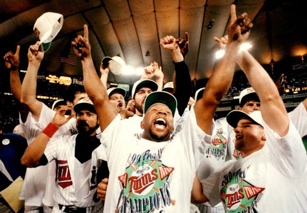Kirby Puckett celebrated the Twins' second World Series championship with teammates in 1991