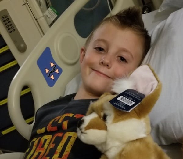 Quinton Hill, 7, lost movement in one arm last month due to a mysterious syndrome known as acute flaccid myelitis. Treatment at Children's Hospital fo