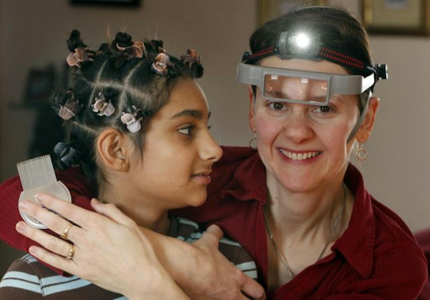 Gonne Assar got so good at sectioning off the hair of her daughter, Adhina Bawa, 12, to search for lice that she turned it into a business: Minnesota Lice Lady.