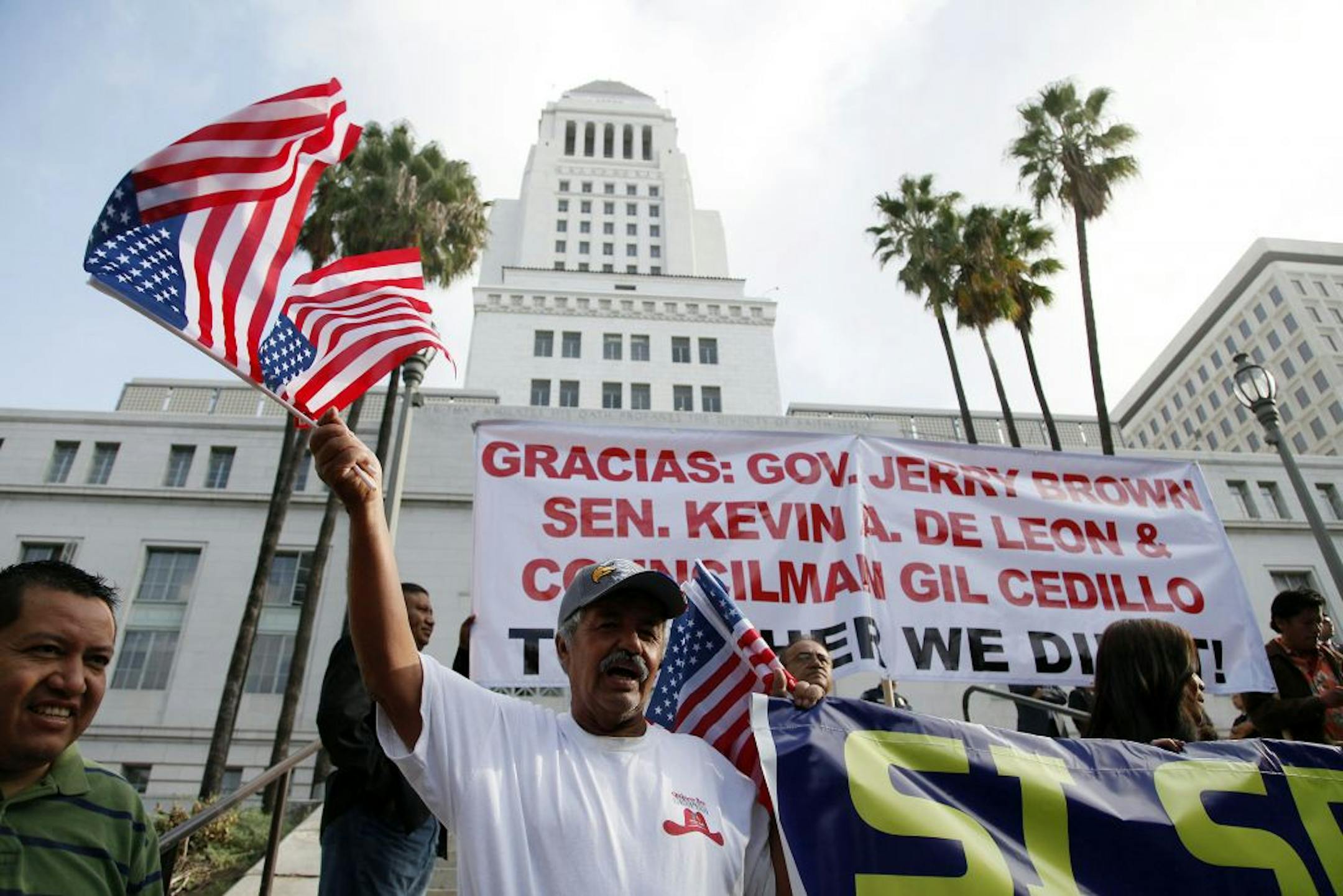 In October, advocates for undocumented residents celebrated outside City Hall after California Gov. Jerry Brown signed the bill AB 60, which allows immigrants in the country illegally to obtain driver licenses.