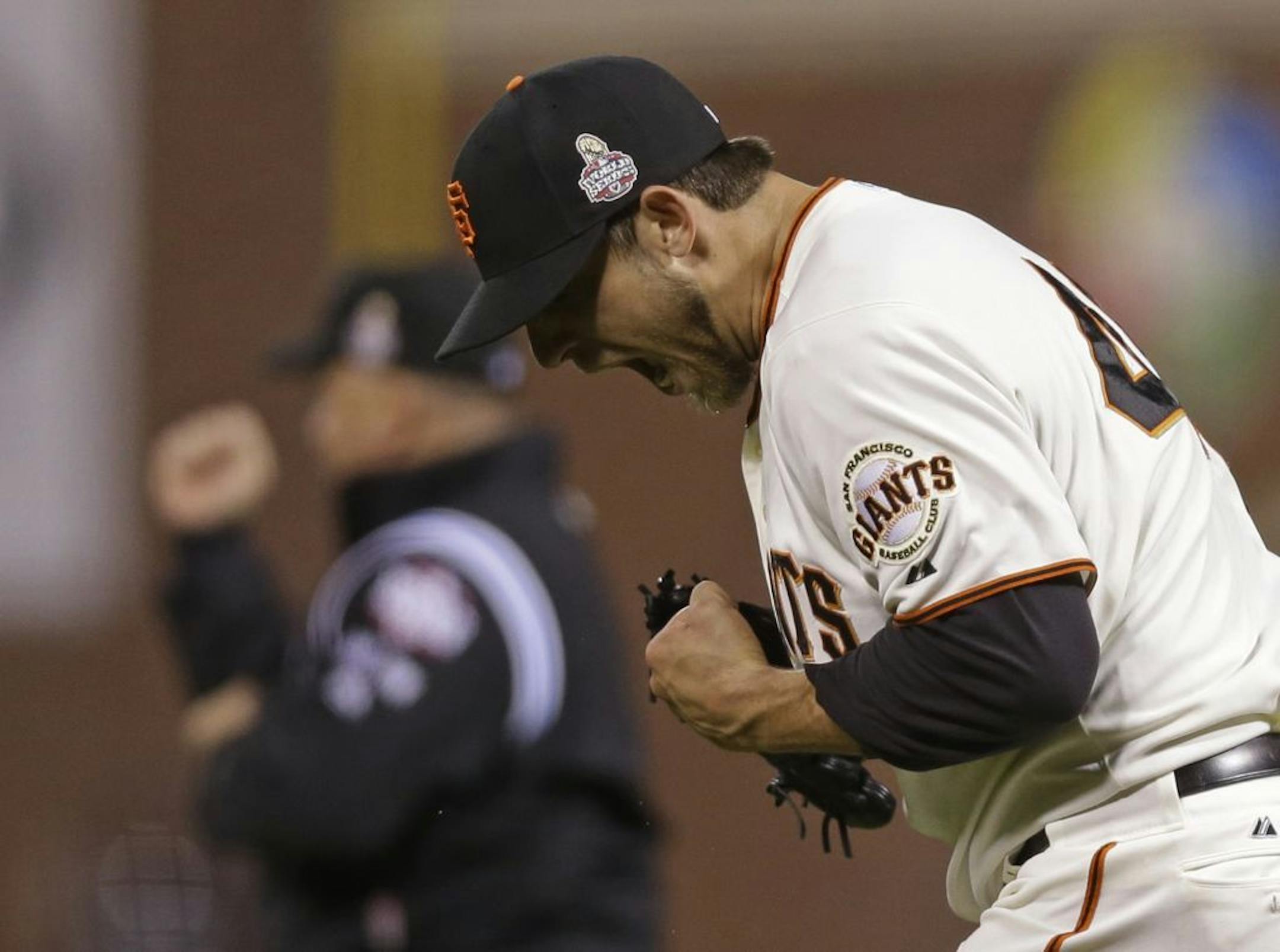 San Francisco Giants starting pitcher Madison Bumgarner reacts after the San Francisco Giants hit into a double play during the seventh inning of Game 2 of baseball's World Series Thursday, Oct. 25, 2012, in San Francisco.
