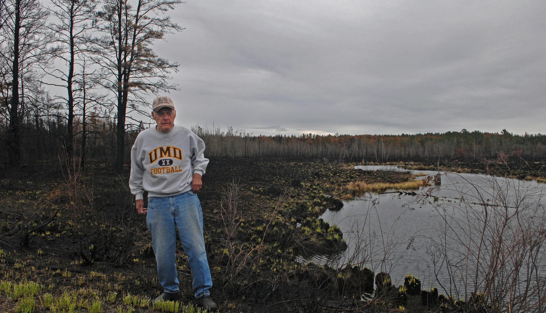 Retired Vikings coach Bud Grant walked a portion of the 400 acres he's owned for about a half-century in northwest Wisconsin. The land, where Grant hunts and fishes, was totally consumed in a recent wildfire inferno started by a logging machine.