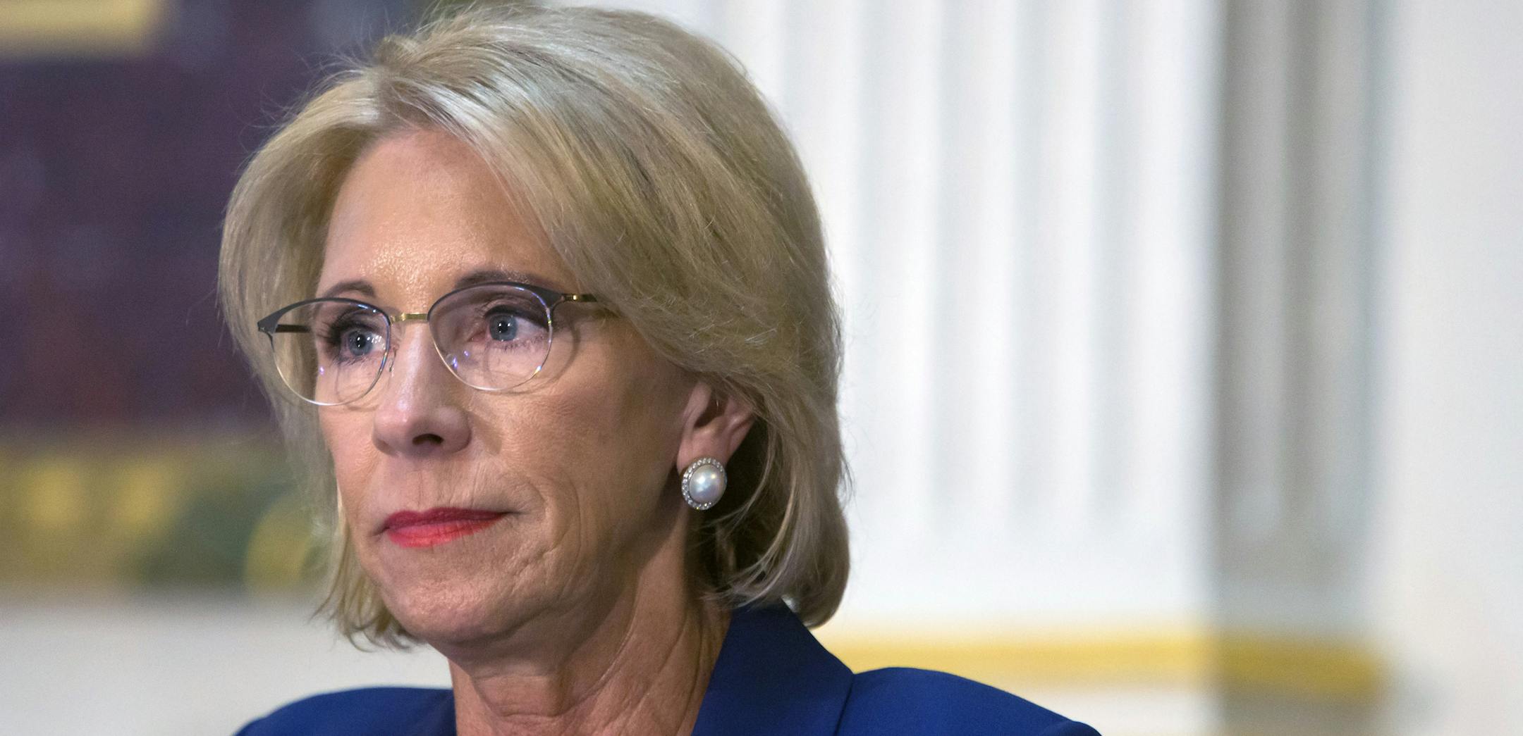FILE ó Education Secretary Betsy DeVos attends a policy meeting in Washington, Aug. 16, 2018.DeVos is preparing new policies on campus sexual misconduct that would bolster the rights of students accused of assault, harassment or rape, reduce liability for institutions of higher education and encourage schools to provide more support for victims. (Eric Thayer/The New York Times)