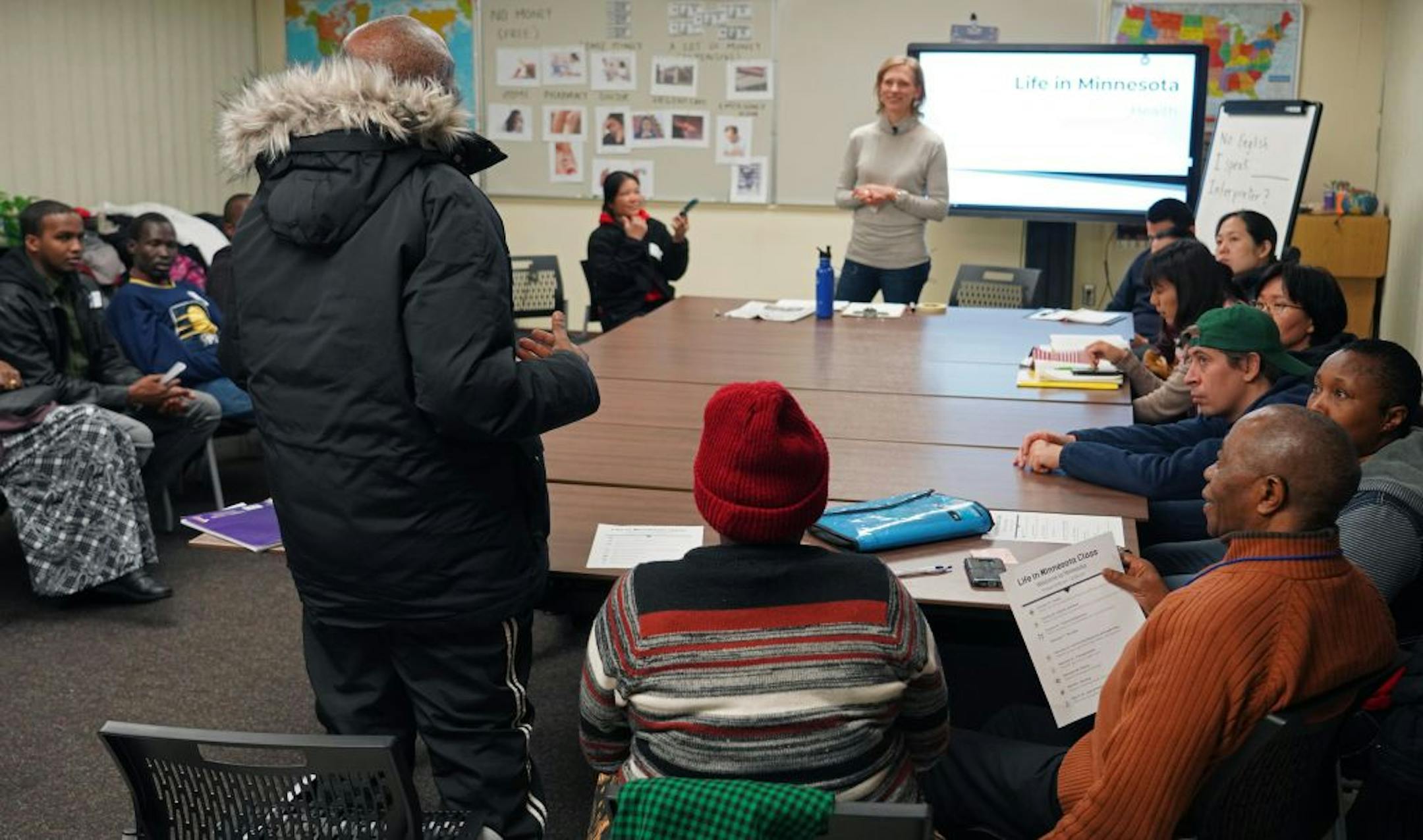 St. Paul nonprofit International Institute of MN helps new Americans make the transition to life in the United States. Among the services they offer is a series of classes titled "Live in MN", that includes everyting from how to navigate the legal system and gain employment as well as Mn-specific education such as how to shovel and dress for winter. Here, Adolphe Tembera, a new immigrant from the Congo, asks a question about health care.