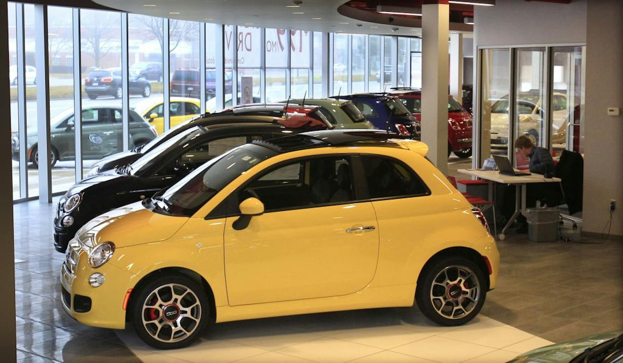 In a Feb. 29, 2012 photo, Fiat 500 vehicles are displayed at the Golling Fiat dealership in Birmingham, Mich. Chrysler Group was the first automaker to report sales Tuesday, April 3, 2012. Its U.S. sales jumped 34 percent in March on strong sales of Fiat small cars and Chrysler sedans.