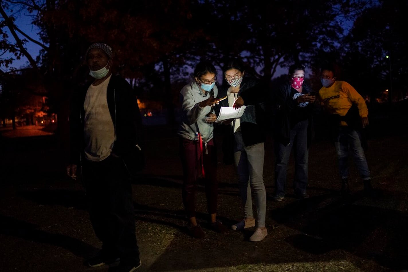 Voters wait in line Nov. 3 at a polling center on Election Day in Kenosha, Wis.