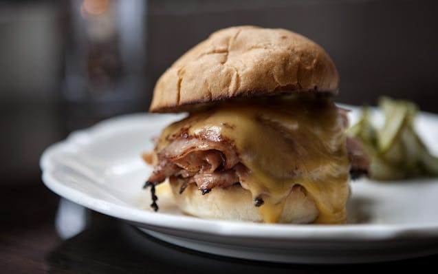 Bologna with cheddar and house pickle at Saint Dinette in St. Paul September 24, 2015. (Courtney Perry/Special to the Star Tribune) ORG XMIT: MIN15092