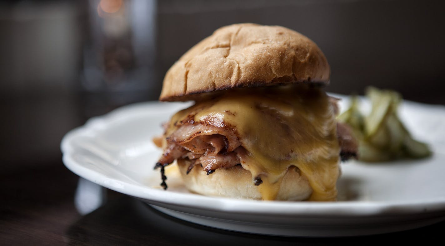 Bologna with cheddar and house pickle at Saint Dinette in St. Paul September 24, 2015. (Courtney Perry/Special to the Star Tribune) ORG XMIT: MIN1509280914120451