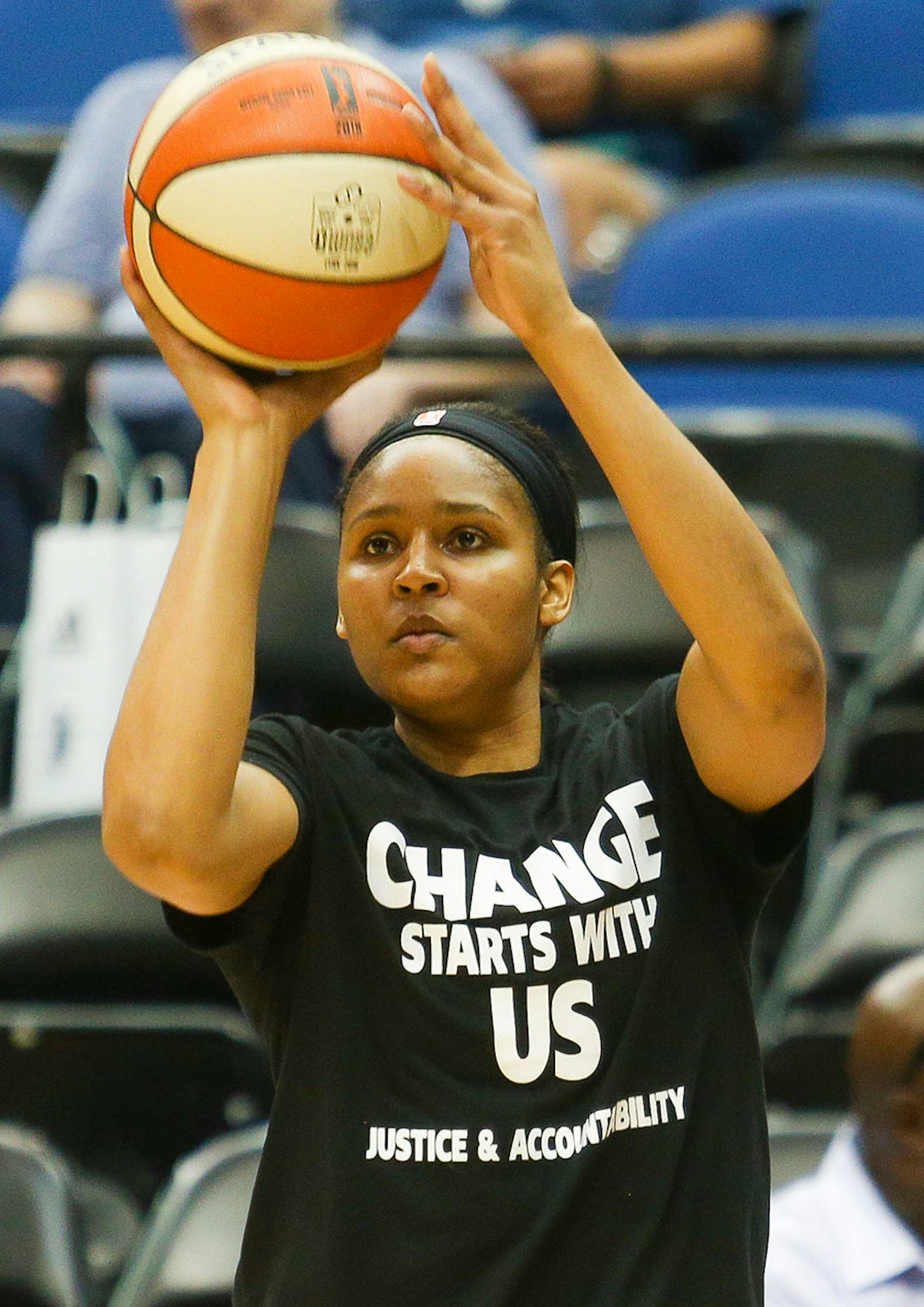 Minnesota Lynx forward Maya Moore (23) warms up before facing the Dallas Wings. Members of the team wore shirts in solidarity for Philando Castile who was killed by a police officer on July 6 in Falcon Heights, Minn.