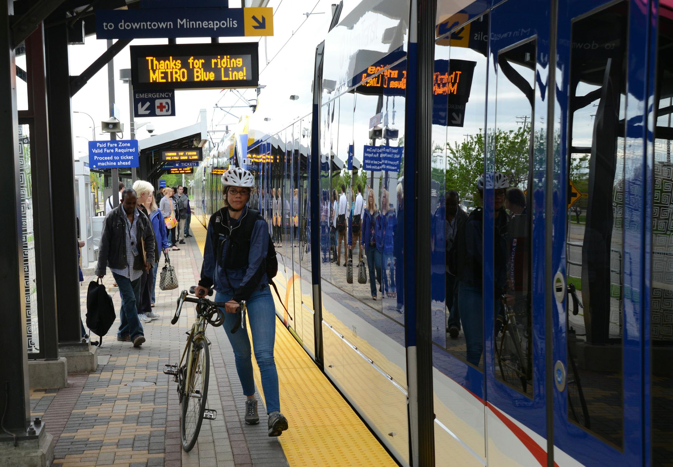 The Hiawatha Light Rail Line is being rebranded as the METRO Blue Line. The Blue Line is the first of the Twin Cities METRO system of rapid transit lines which include METRO Red Line Bus Rapid Transit on Cedar Ave. METRO Blue Line trains will now have three cars and will run every ten minutes throughout most of the day. Twelve new light-rail vehicles dedicated to the line will allow this increased service capacity. During the kickoff event Metro Transit staff handed out Blue line pens, new sched