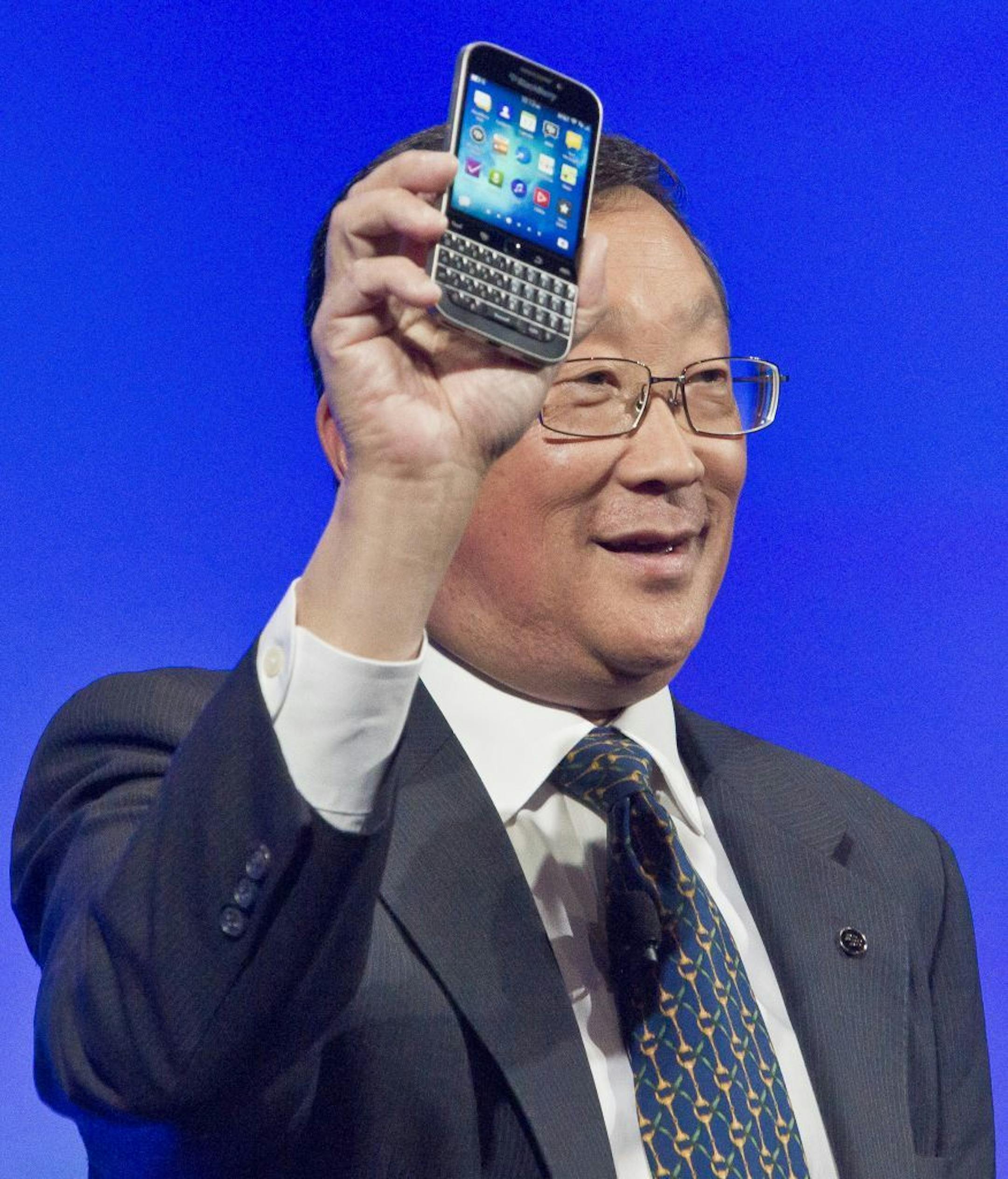BlackBerry CEO John Chen introduces the company's new phone, the BlackBerry Classic, during a news conference, Wednesday, Dec. 17, 2014, in New York.