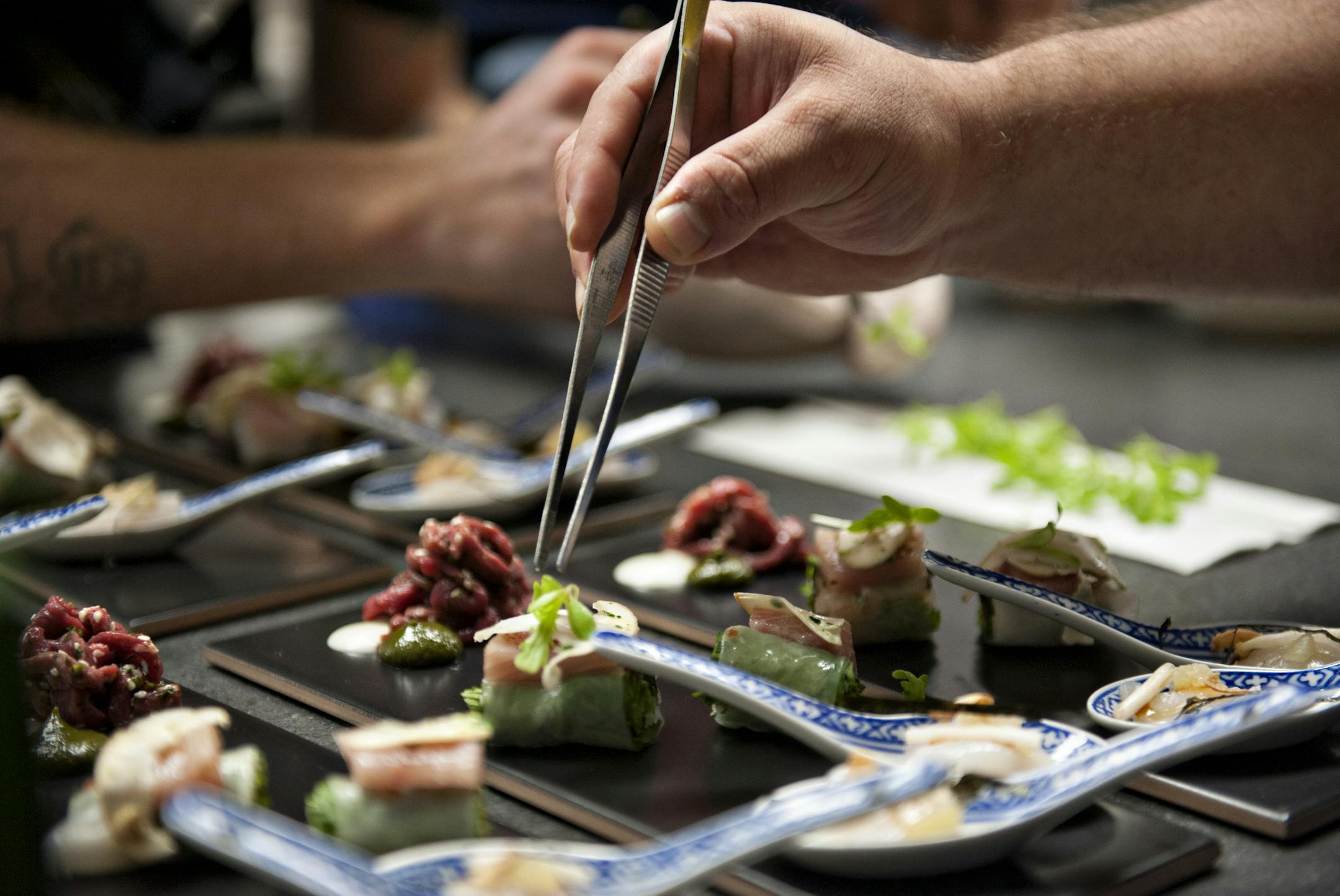 Great precision is used in preparing the courses served at Umami. Photo by Leslie Plesser.