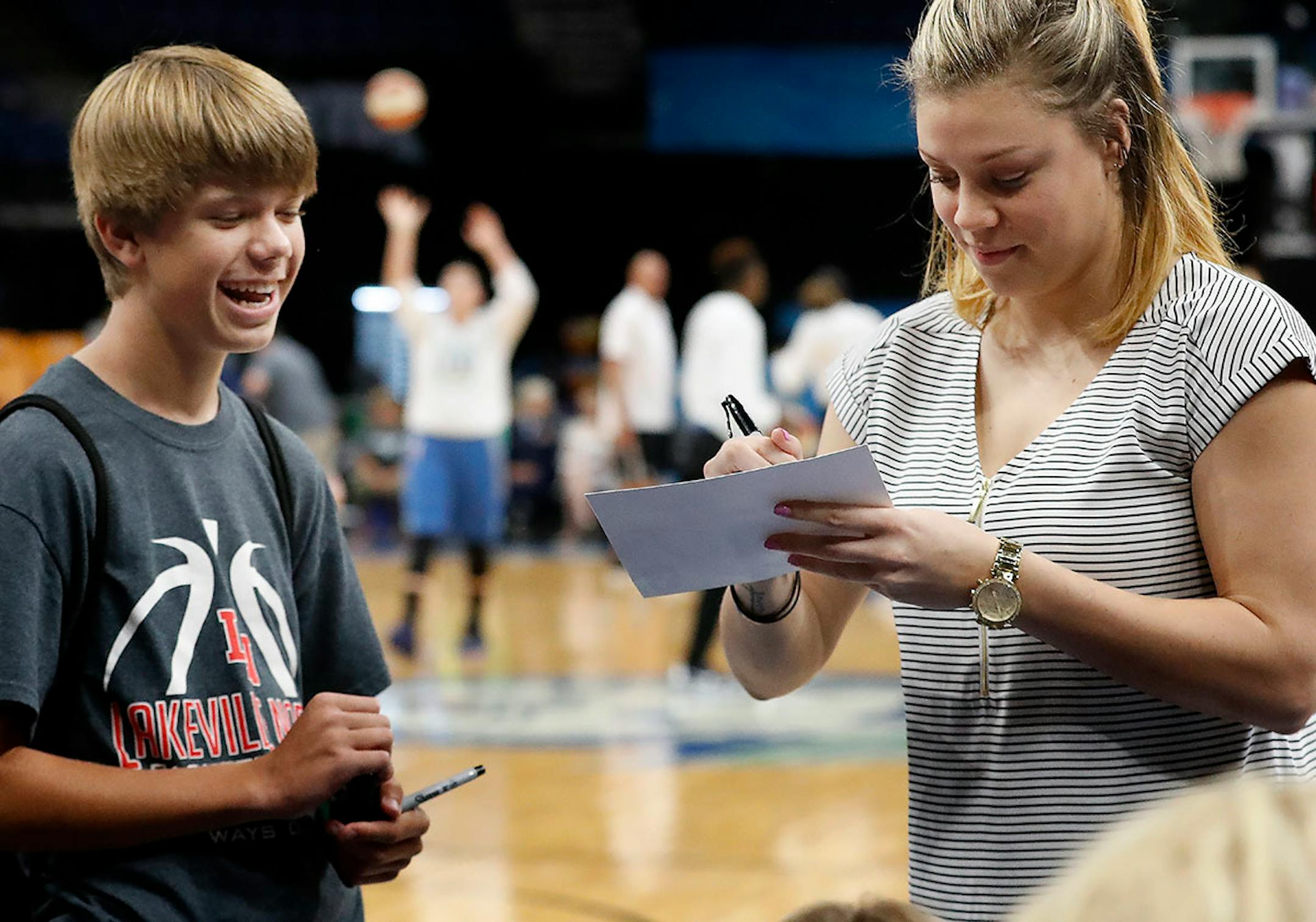 Rachel Banham of the Connecticut Sun signed autographs for fans before Sunday's game. Banham is a former Minnesota Gopher.
