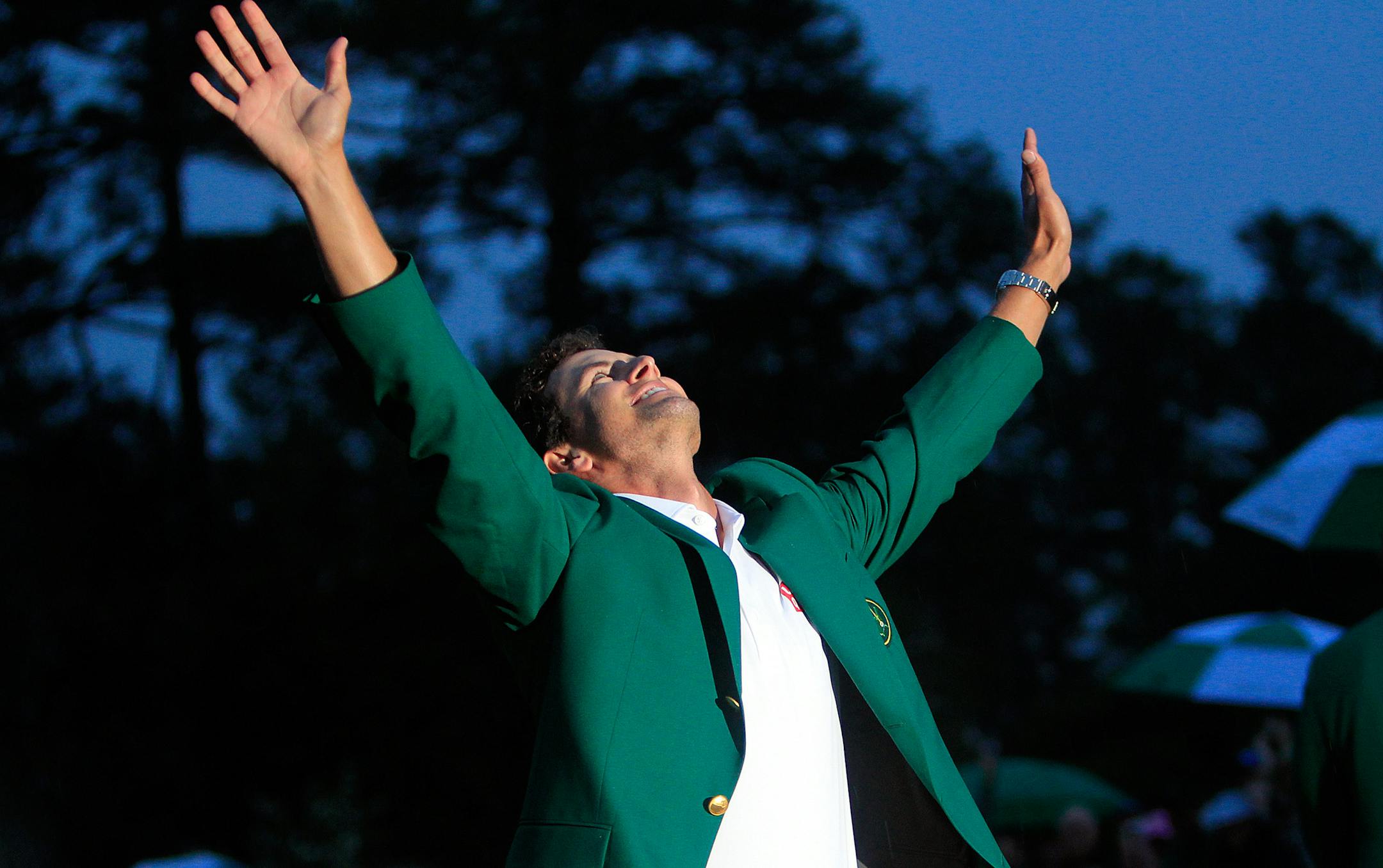 Adam Scott celebrates winning The Masters at Augusta National Golf Club