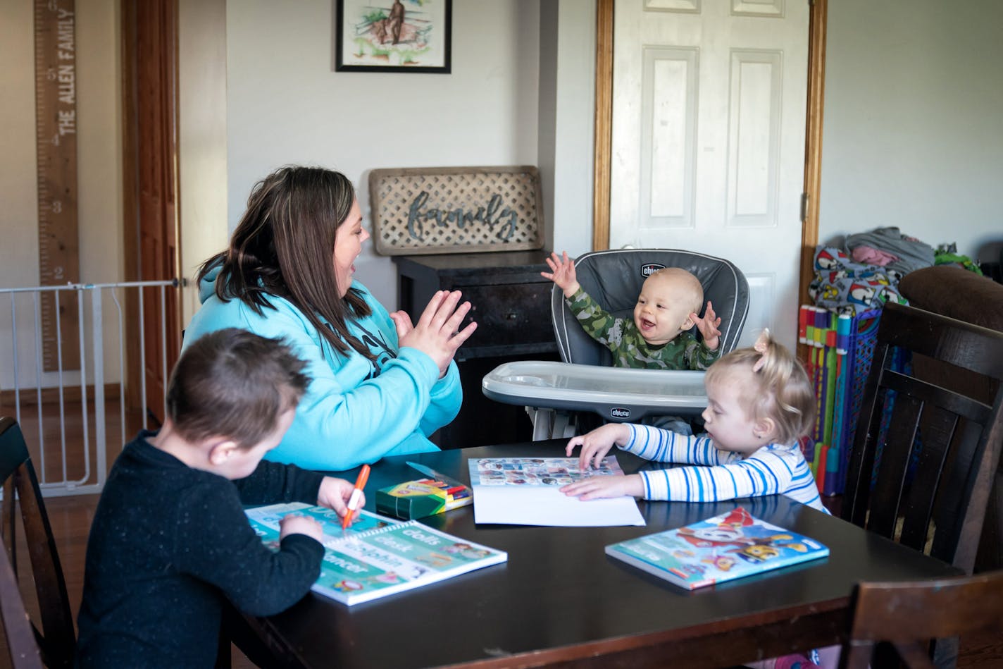 Emily Allen, a nurse who is working at Bethesda Hospital - which is handling COVID-19 cases - worked and played with her kids on her day off. Leo, 4, worked on letters of the alphabet, Lilly, 3 worked on numerals while Sully, 11 months watched and tried to join in. She told them if they studied, then they could go outside and do sidewalk chalk in the driveway.