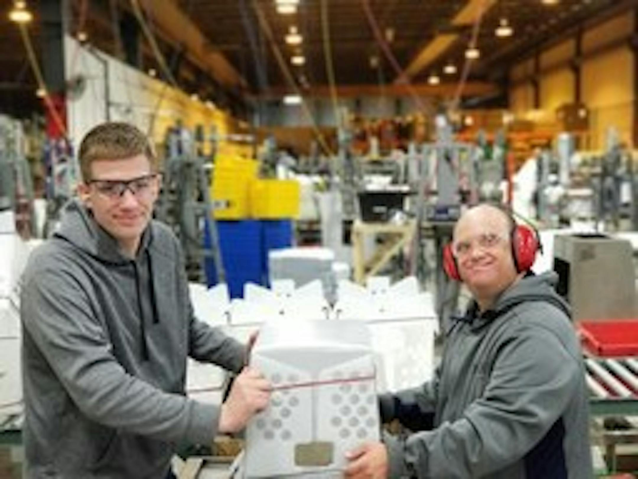 Noah Patton, left, and Kirk Jacobson work at MDI's northeast Minneapolis plant in 1990. Photo: MDI