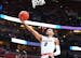 ANAHEIM, CA - MARCH 28: Gonzaga guard Geno Crandall (0) drives to the basket during the NCAA Division I Men's Championship Sweet Sixteen round basketb