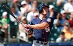 Twins right fielder Max Kepler (26) bats in a spring training baseball game against the Miami Marlins Friday, March 10, 2017, in Jupiter, Fla.