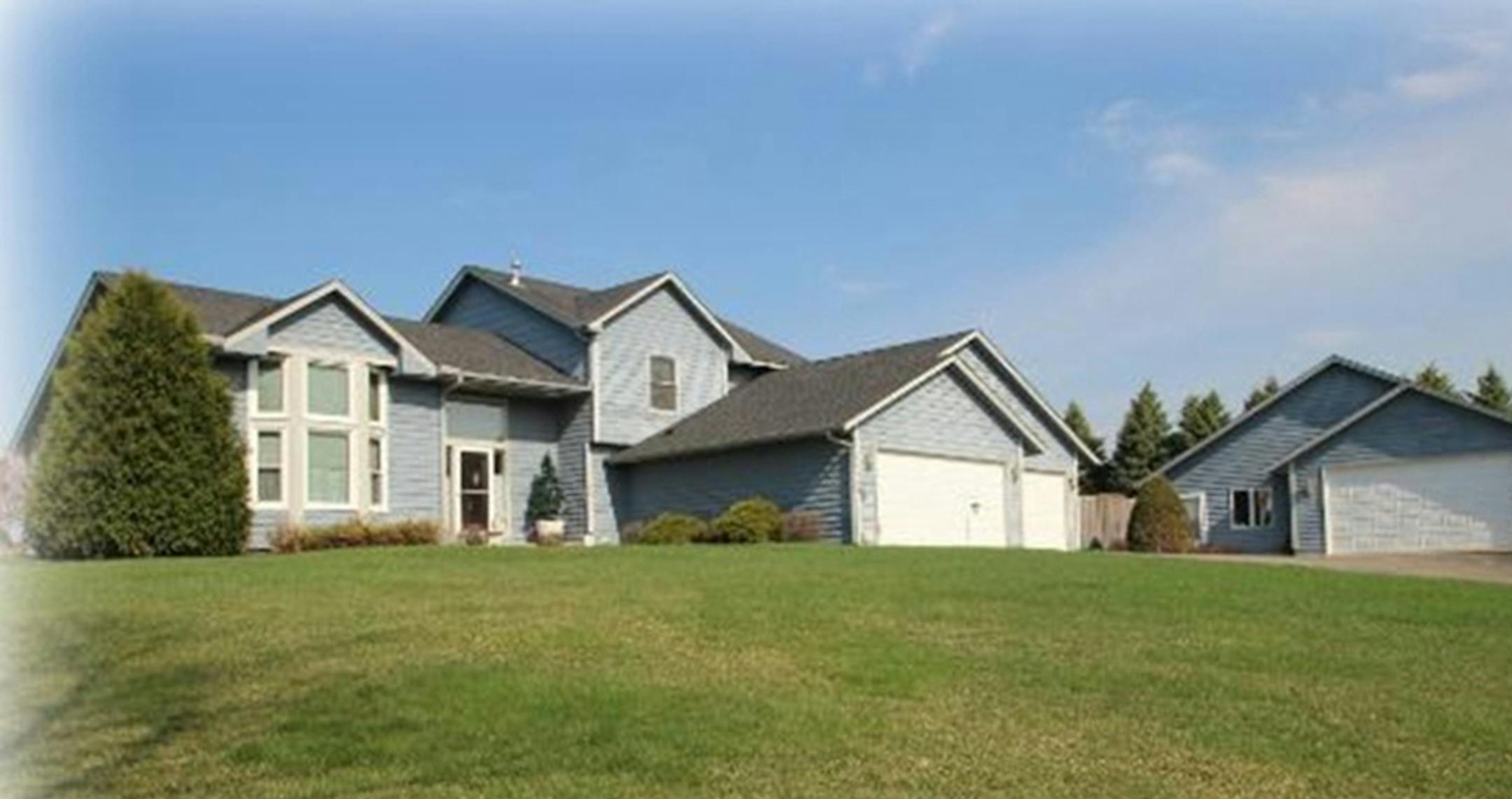 ... Corcoran
Built in 1992, this four-bedroom, three-bath house has 3,269 finished square feet and features three bedrooms on one level, main floor bedroom, fireplace, full finished basement, three-car attached garage and two-car detached gargage/shop on a 1.5-acre lot. Listed by Carrie Schmitz, Keller Williams Classic Realty Northwest, 763-227-1405.