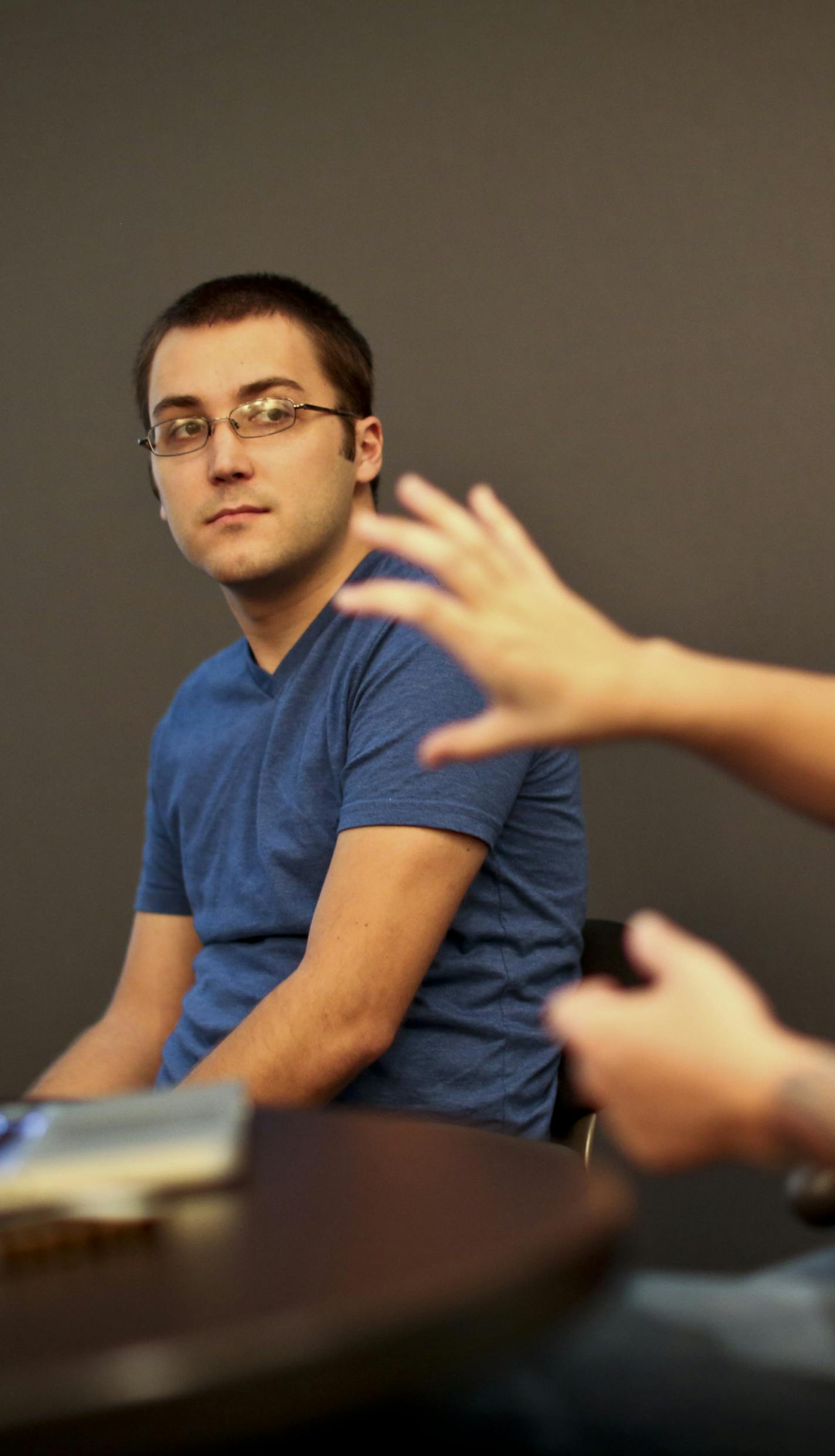 Chris Smalley, 27, started his new job at Clockwork Active Media Systems in Minneapolis, Minn., two weeks ago. He was photographed in a meeting at the office on Thursday, July 19, 2012.