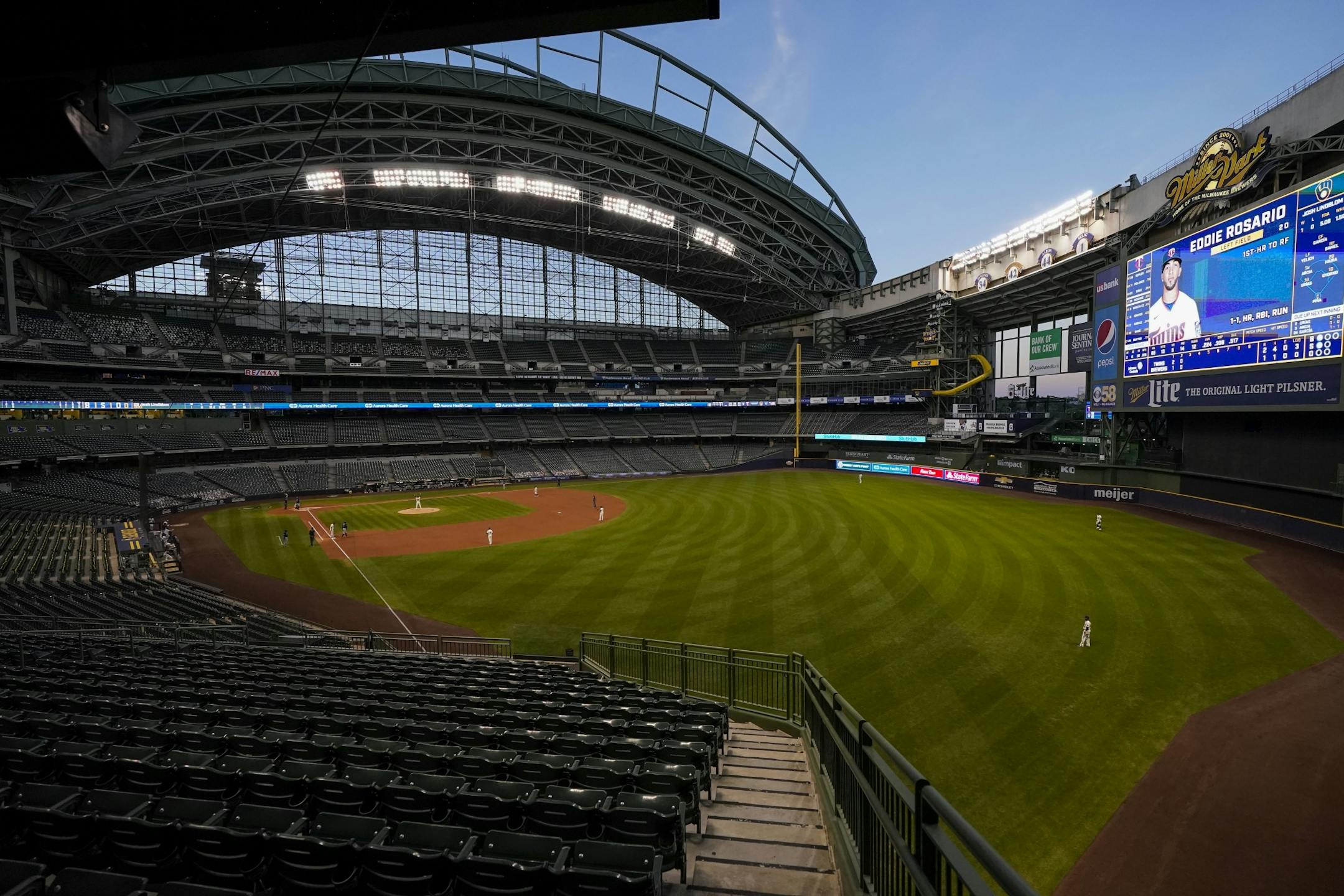 The seats are empty at Miller Park during the third inning of a baseball game between the Milwaukee Brewers and the Minnesota Twins Tuesday, Aug. 11, 2020, in Milwaukee.