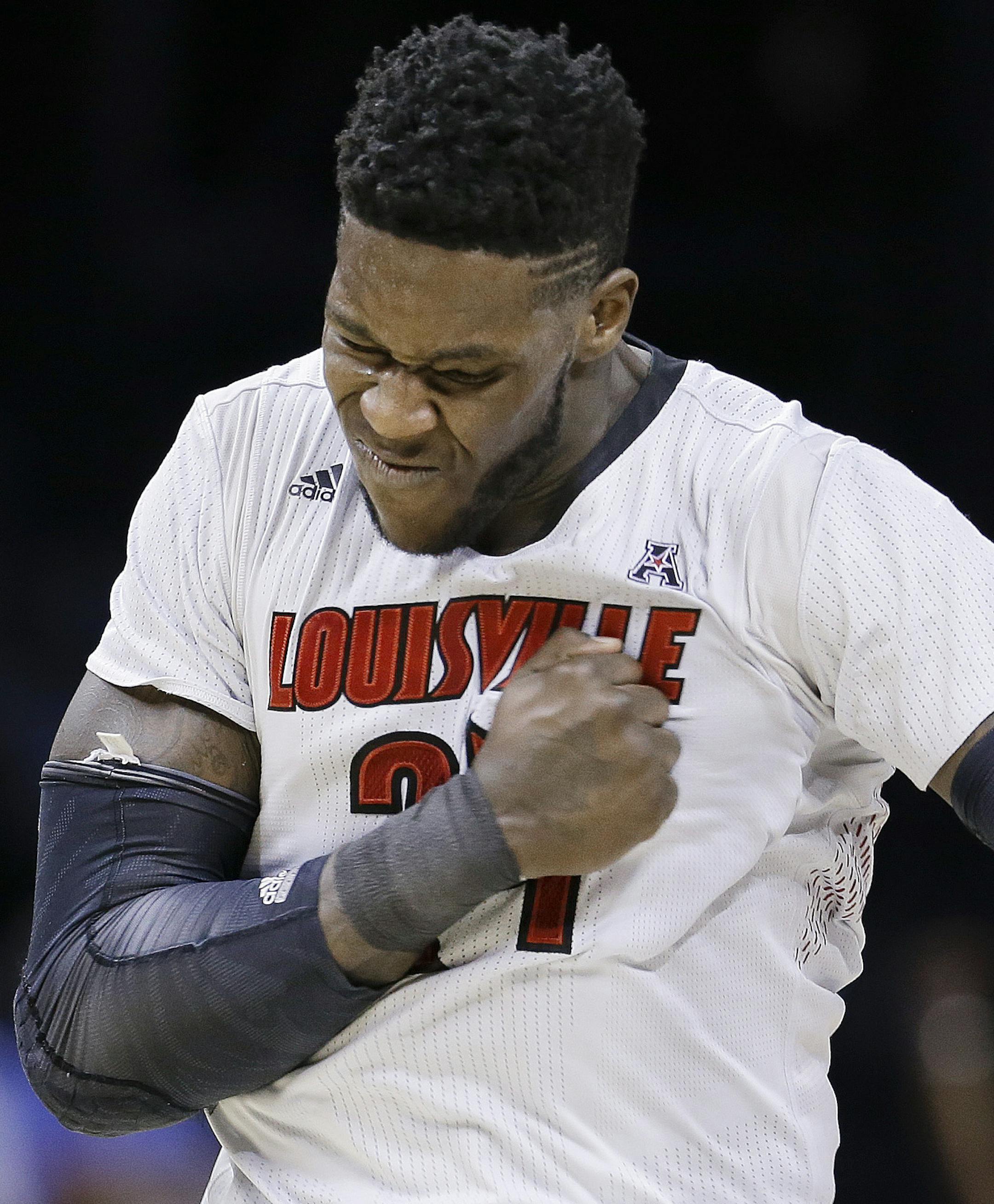 Louisville forward Montrezl Harrell celebrates after scoring against Connecticut during the second half of an NCAA college basketball game in the final of the American Athletic Conference men's tournament Saturday, March 15, 2014, in Memphis, Tenn. Louisville won 71-61. (AP Photo/Mark Humphrey)
