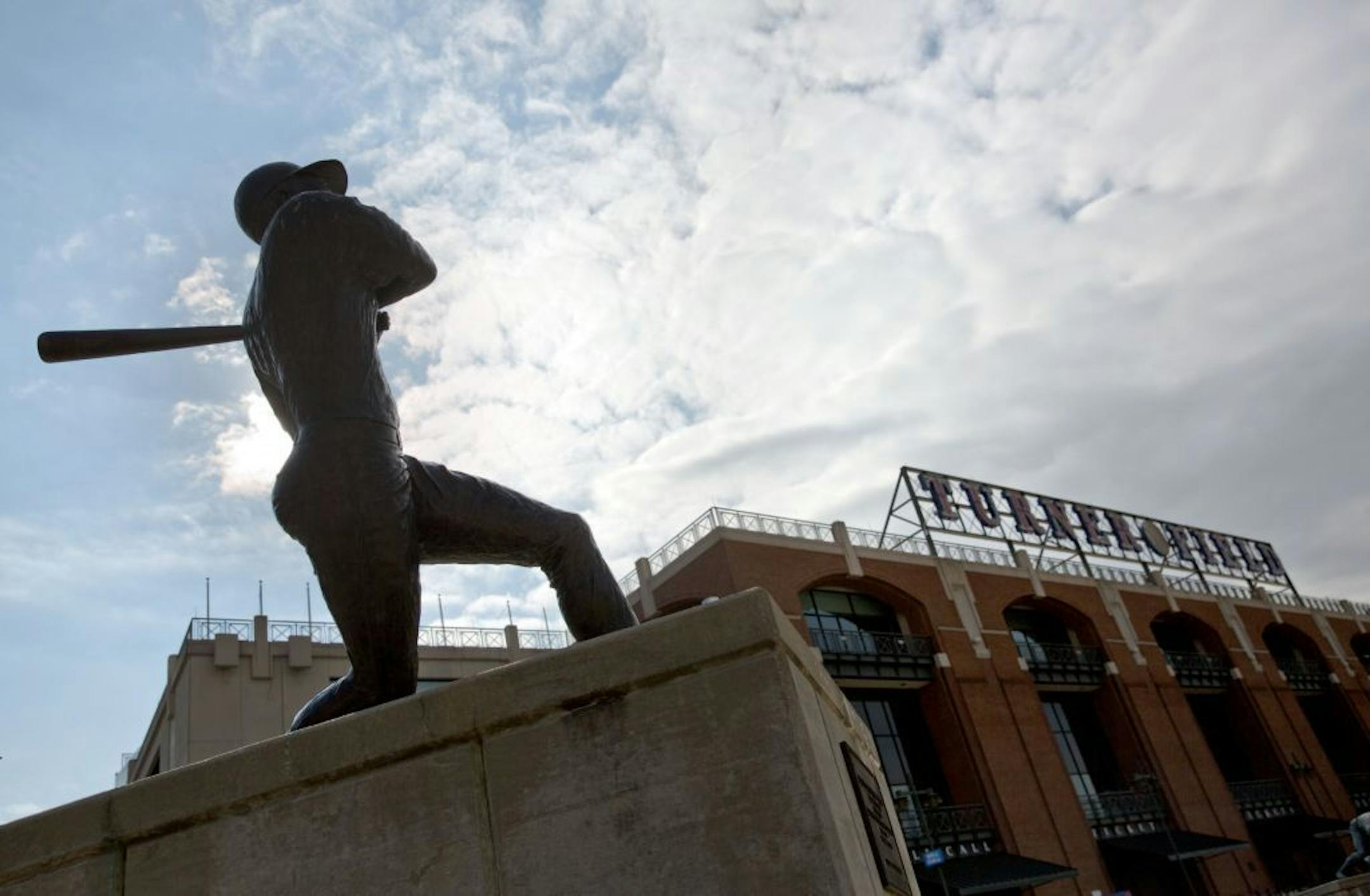 A statue of Hall of Fame baseball player Hank Aaron stands outside Turner Field, the home of the Atlanta Braves, Tuesday, Nov. 12, 2013, in Atlanta. The Braves unexpectedly announced Monday they are moving in 2017 to a new stadium.