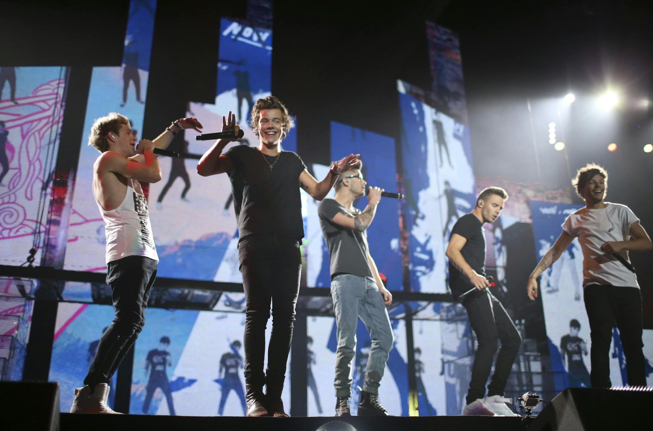 British boy-band phenomenon One Direction performed at Target Center in Minneapolis Thursday night, July 18, 2013. One Direction early in their show Thursday night. ] JEFF WHEELER ‚Ä¢ jeff.wheeler@startribune.com