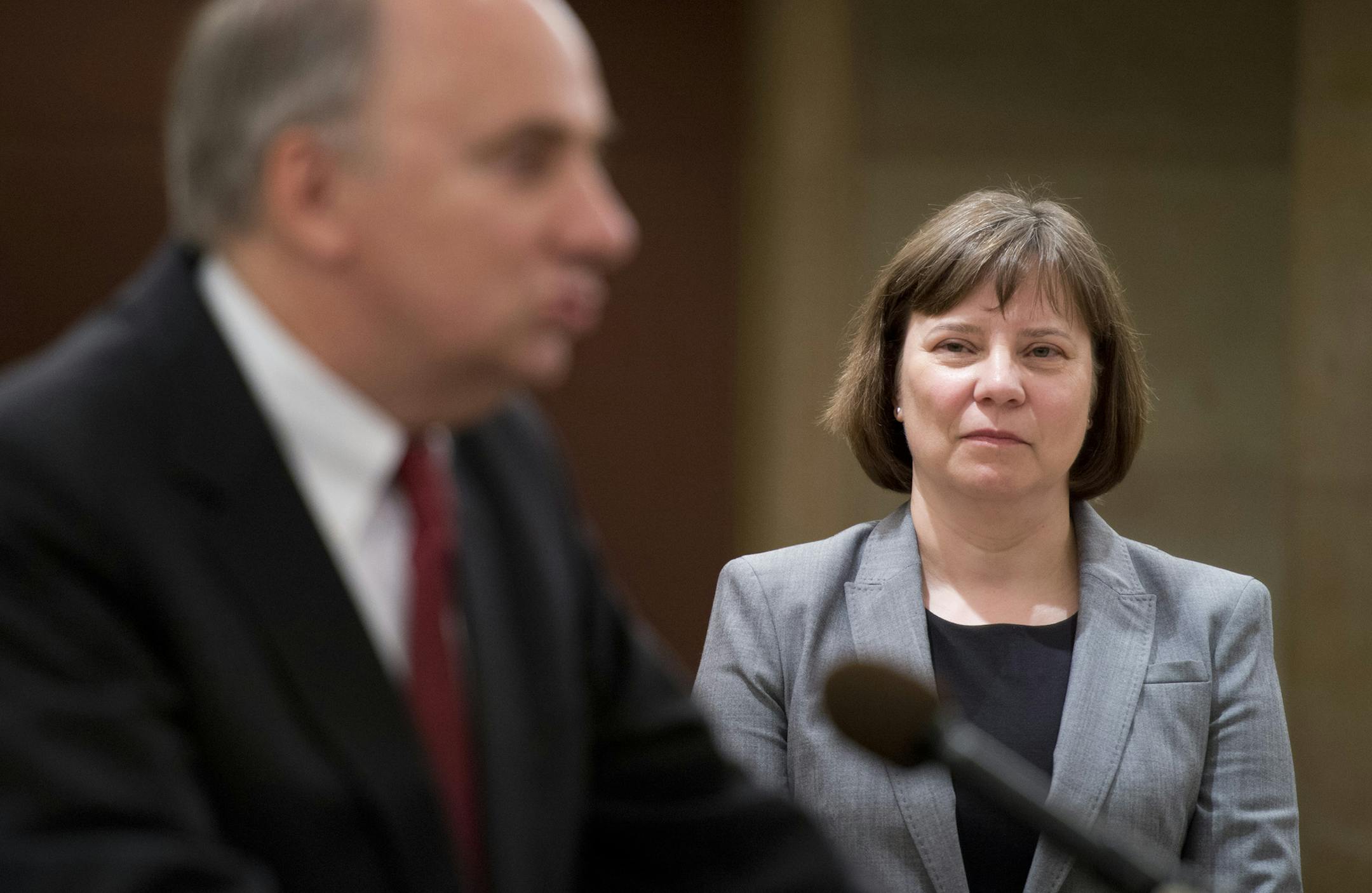 Dr. Laura Kalambokidis, Stinson's successor looked on as he spoke. Minnesota Management & Budget Commissioner Jim Schowalter and State Economist Dr. Tom Stinson announced Monday, June 3, 2013 that Stinson will be retiring. Dr. Laura Kalambokidis, a professor of applied economics at the University of Minnesota has been named his successor. ] GLEN STUBBE * gstubbe@startribune.com