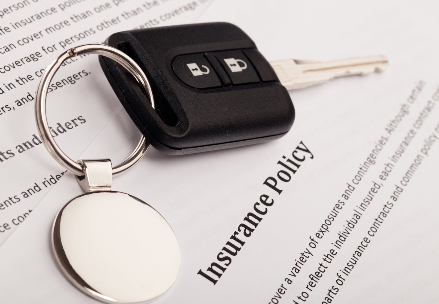 Car Key on an Insurance Policy