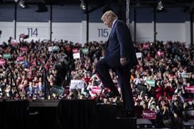 President Donald Trump arrives at W.K. Kellogg Airport to attend a campaign rally, Wednesday, Dec. 18, 2019, in Battle Creek, Mich. (AP Photo/ Evan Vu