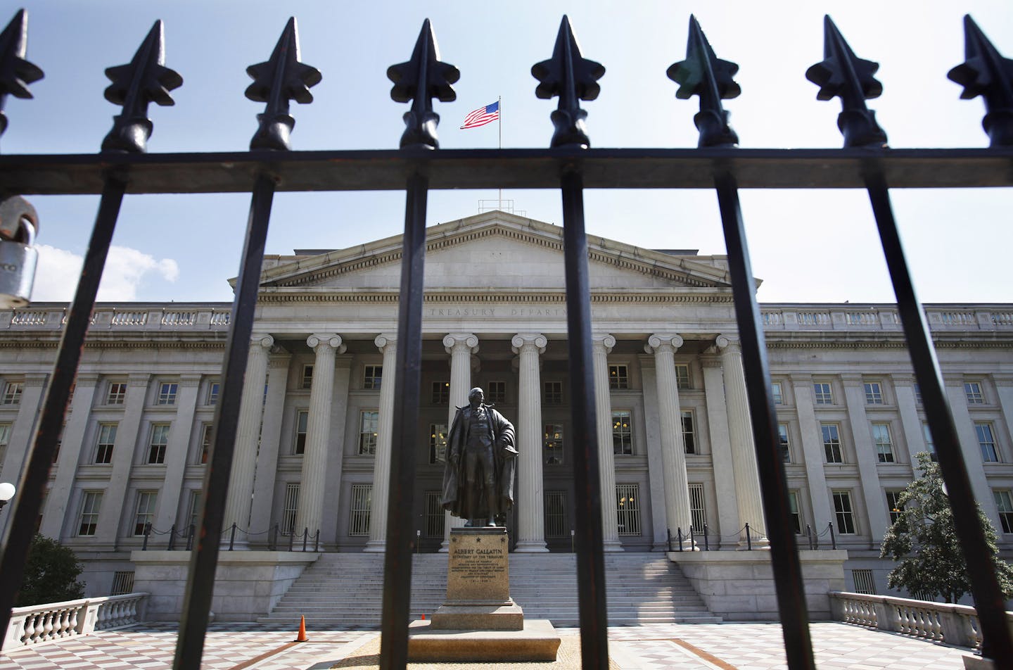 FILE- This Monday, Aug. 8, 2011, file photo, shows the Treasury Building in Washington. The Treasury Department releases federal budget data for November 2014 on Wednesday, Dec. 10, 2014. (AP Photo/Jacquelyn Martin, File) ORG XMIT: NYBZ150