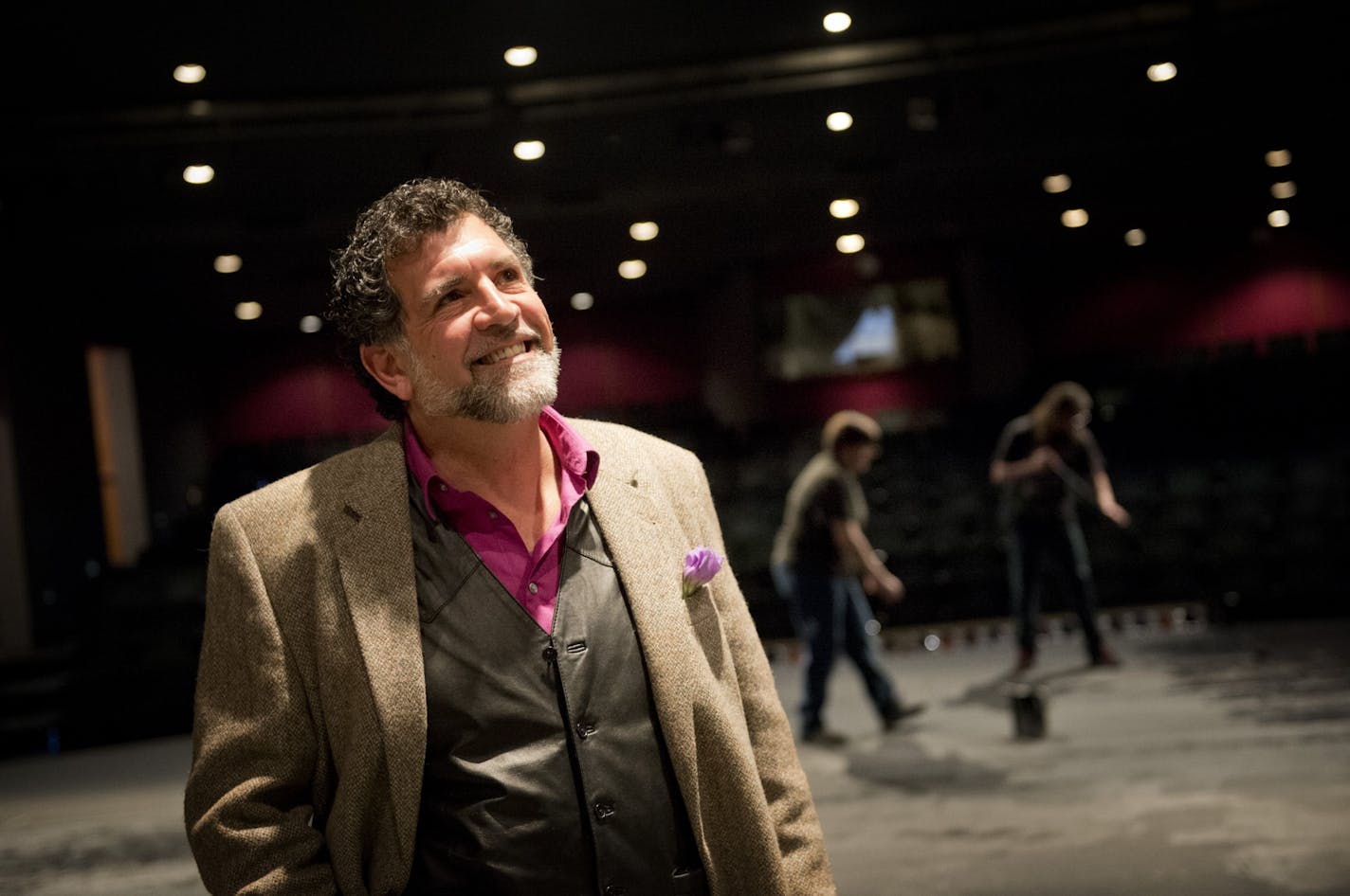 Gregory Stavrou, executive director of Rochester Civic Theater is part of the vibrant and growing arts community in Rochester. Behind him workers repainted the stage for an upcoming production of The Producers. For more than a century, the city of Rochester has been shaped and defined by the Mayo Clinic. Now the Mayo has a $6 billion vision to reshape the city and itself.Wednesday, February 21, 2013