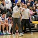 Khalid El-Amin, shown coaching during a high school basketball game in March 2023, is set to get a $15,000 settlement from the city of Minneapolis in 