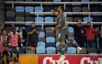 Minnesota United forward Ramon Abila (9) celebrates after he headed the ball into the Vancouver Whitecaps goal during an MLS soccer match, Wednesday, 