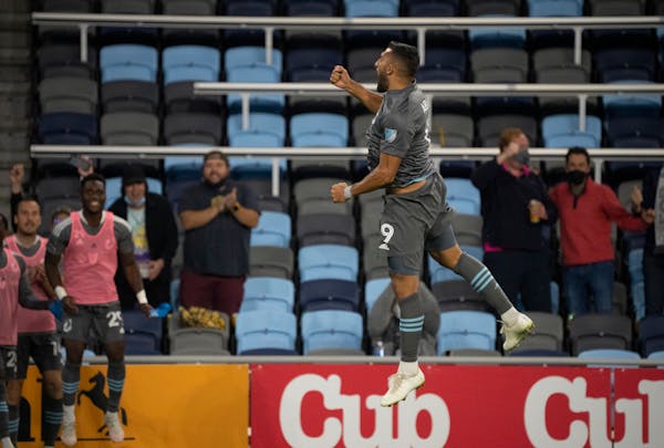 Minnesota United forward Ramon Abila (9) celebrates after he headed the ball into the Vancouver Whitecaps goal during an MLS soccer match, Wednesday, 