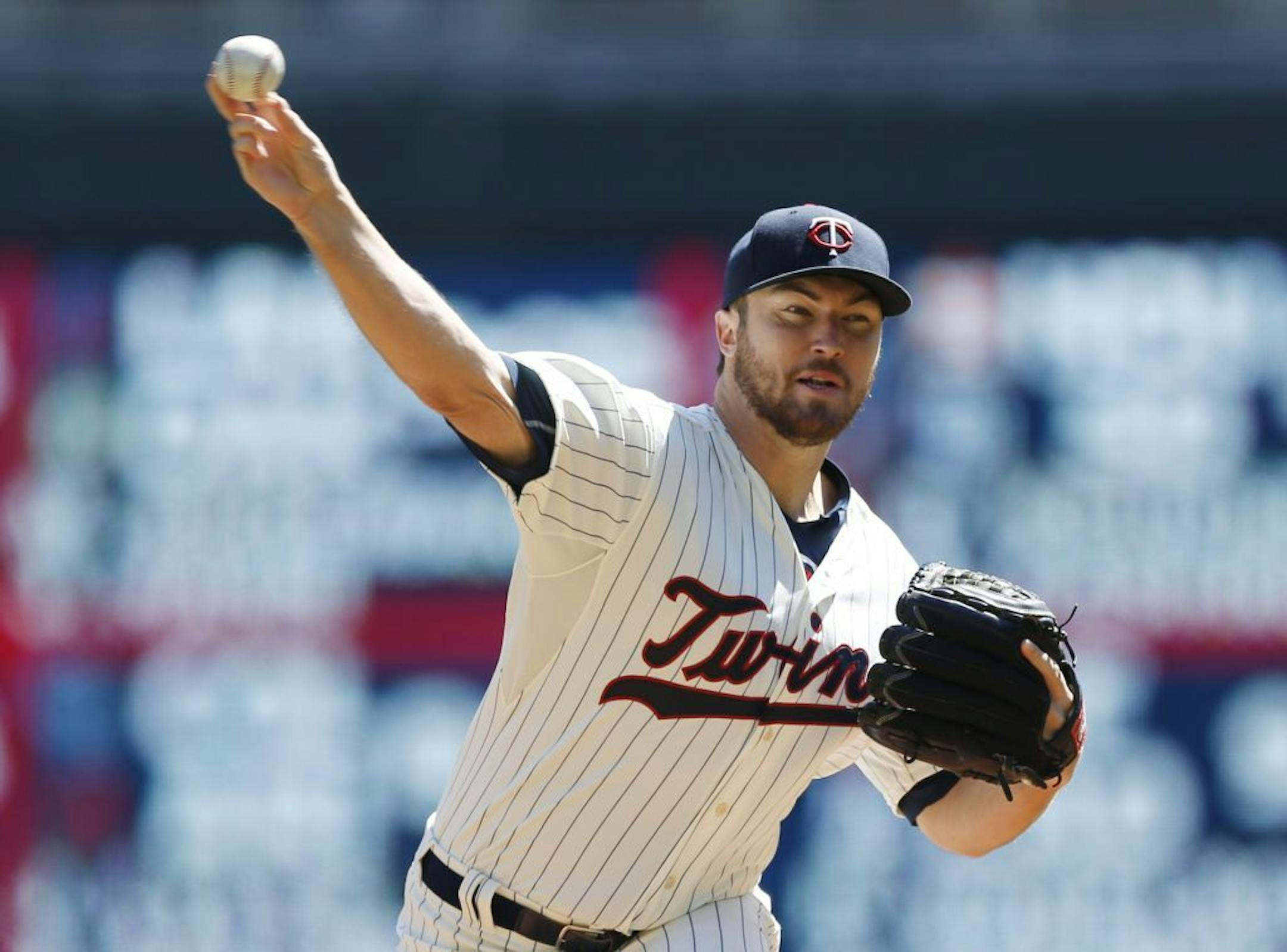Minnesota Twins pitcher Phil Hughes throws against the Detroit Tigers in the first inning of a baseball game, Wednesday, April 29, 2015, in Minneapolis.