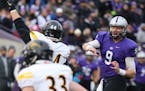 St. Thomas quarterback Alex Fenske (9) fires a 4-yard touchdown strike to tight end Matt Christenson, not pictured, during the first quarter of NCAA D
