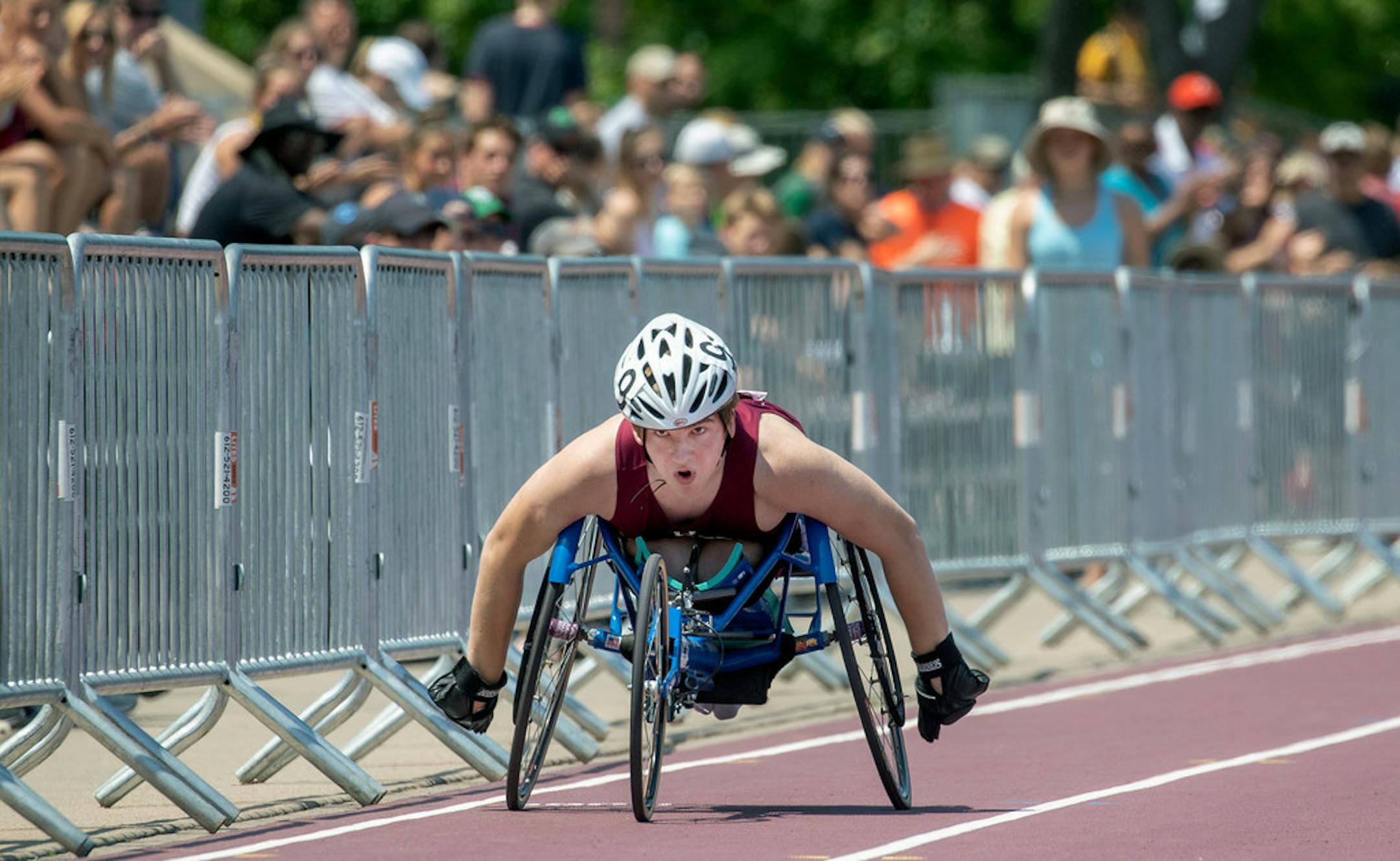 Duluth Denfeld's Blake Eaton had his eyes on the finish line as he broke a record in the 200 meter dash wheelchair division at the Class 2A boys and girls state meet at Hamline University's Klas Field